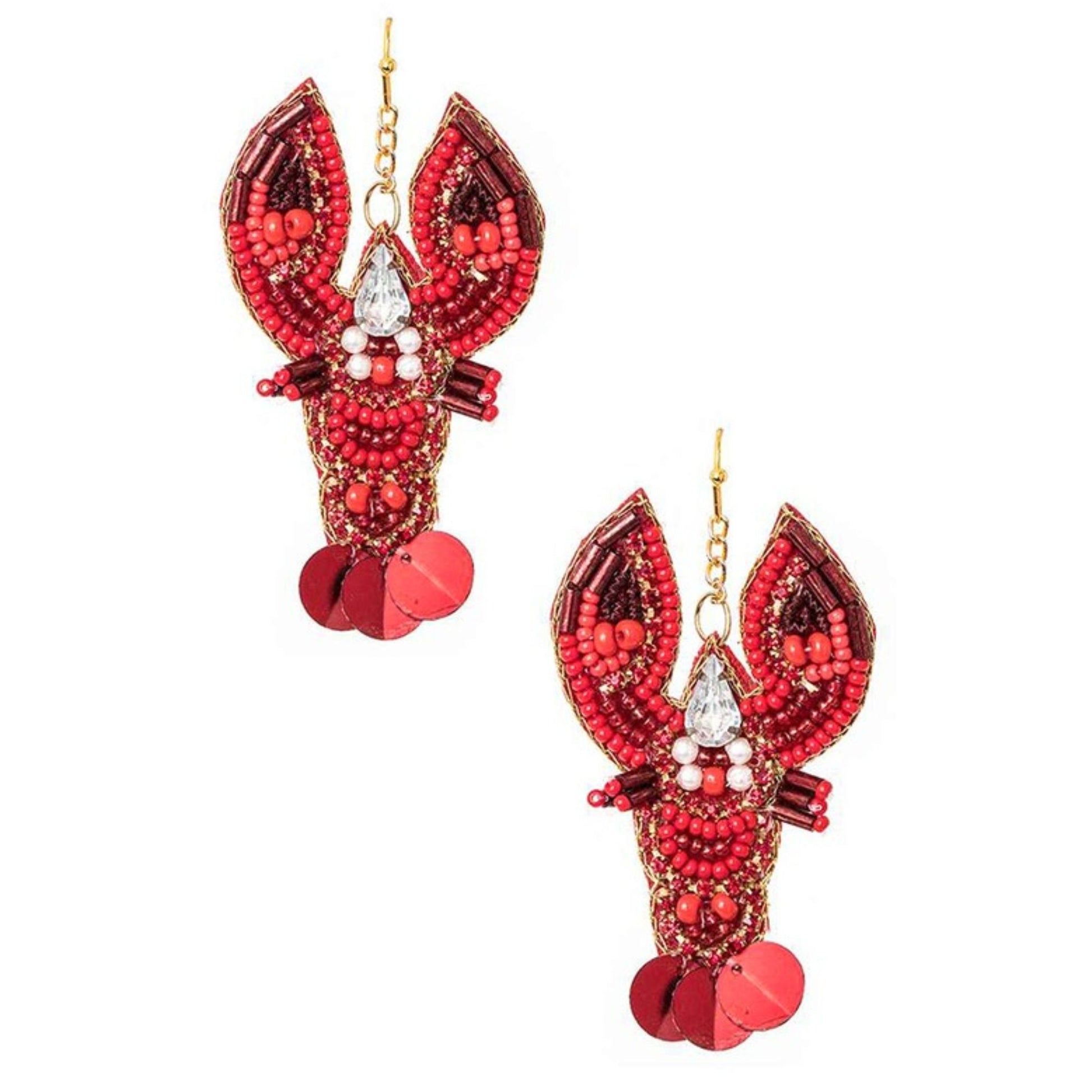 Red beaded lobster earrings on a white background