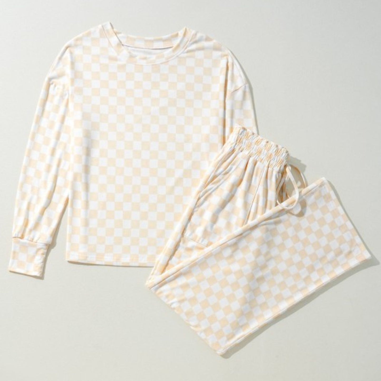 Polka dot pajama set on a light gray background