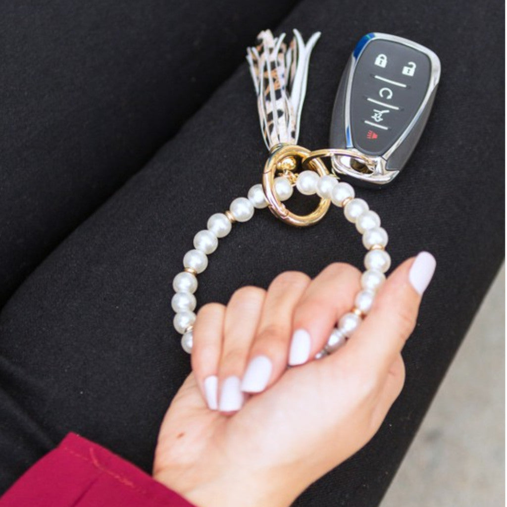 Classic Pearl Leopard Key Ring Bracelet with Woman in Black Jeans