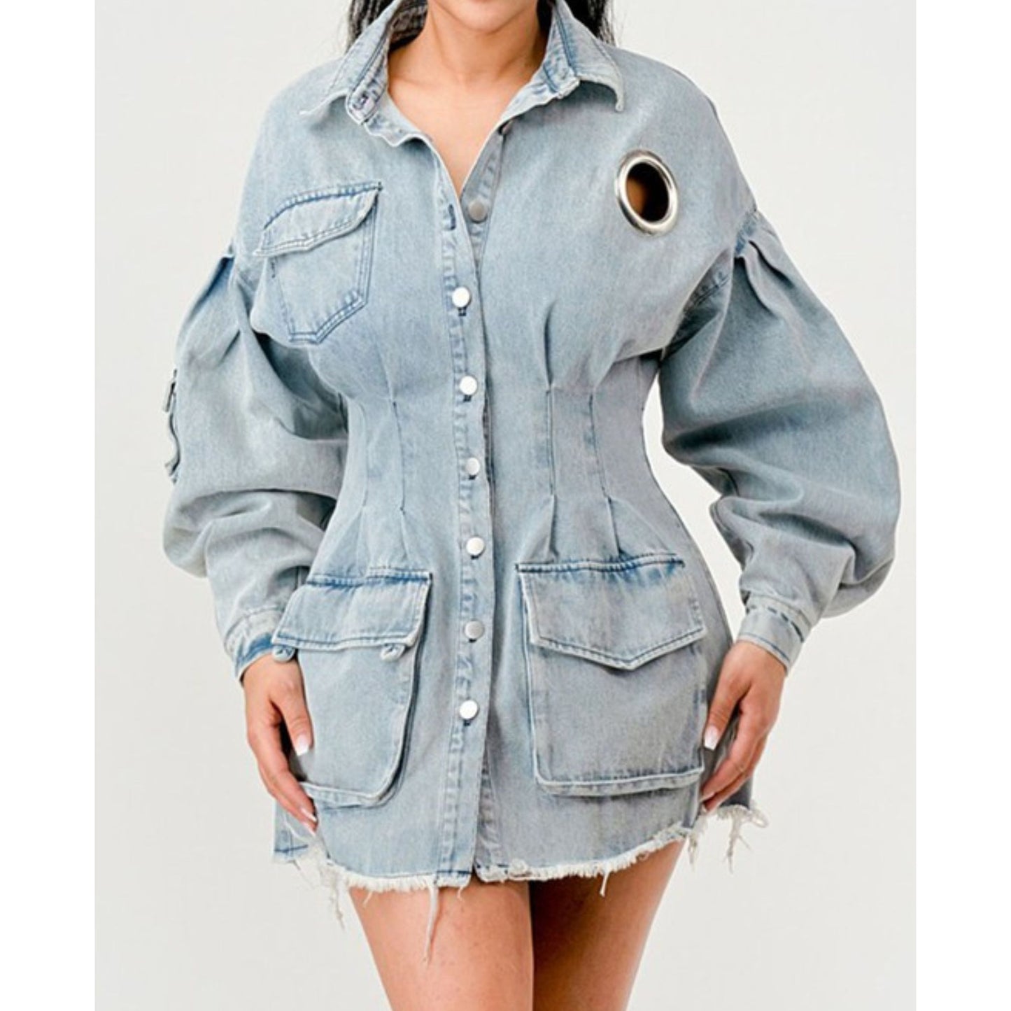 Light blue denim jacket worn by a person on a white background