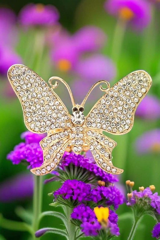 Gold Crystal Butterfly Iconic Stretch Ring on Floral Background