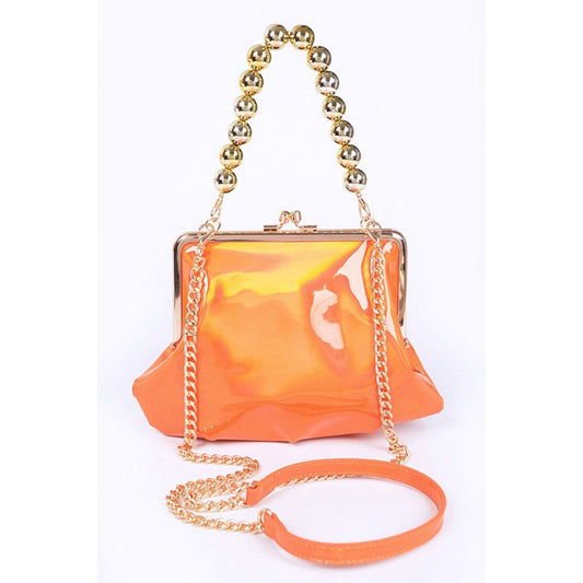 Orange handbag with gold chain handle and strap on a white background