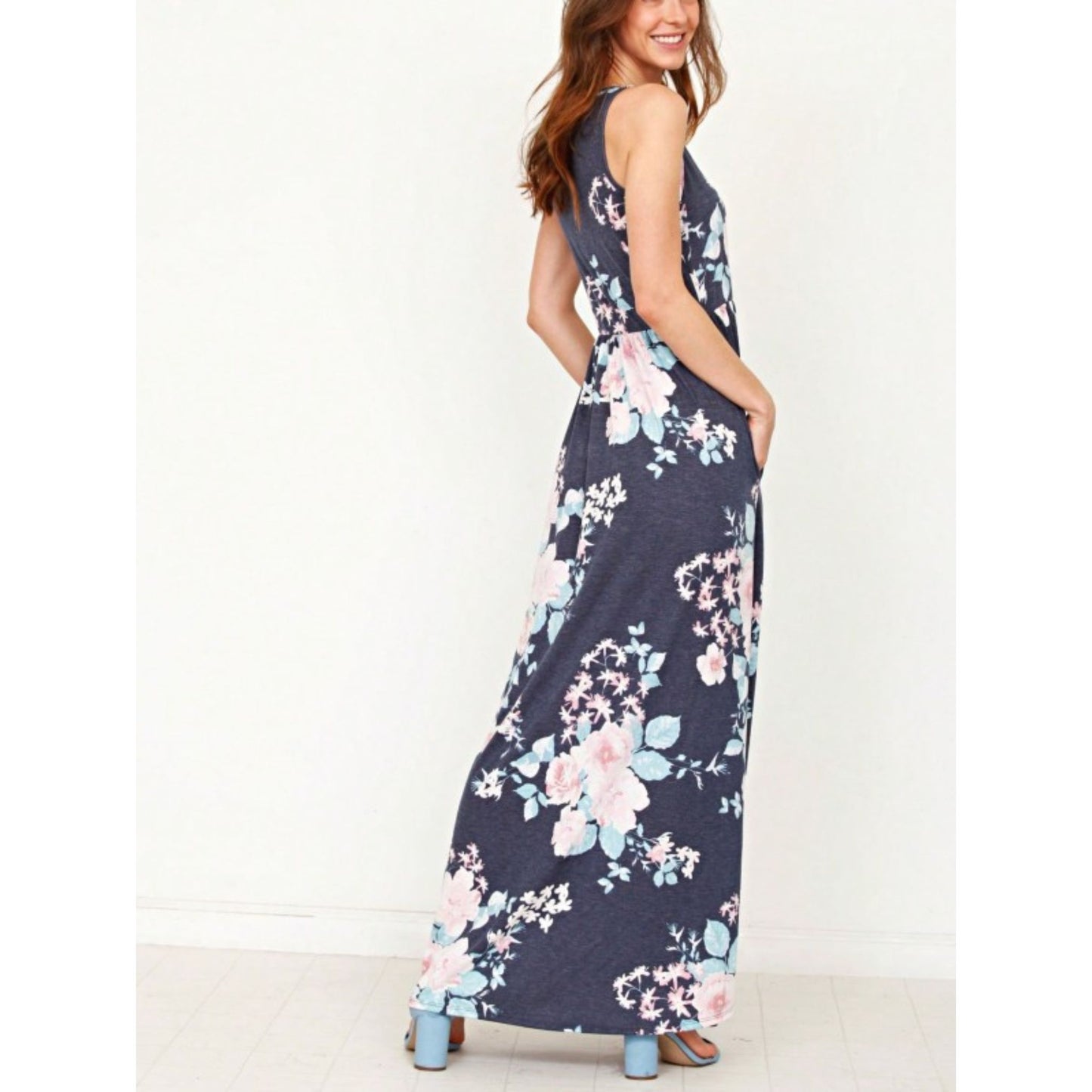 Navy_Vintage_Floral_Maxi_Dress_with_Hidden_Pockets_on_Model_Back_view_with_hands_in_pockets