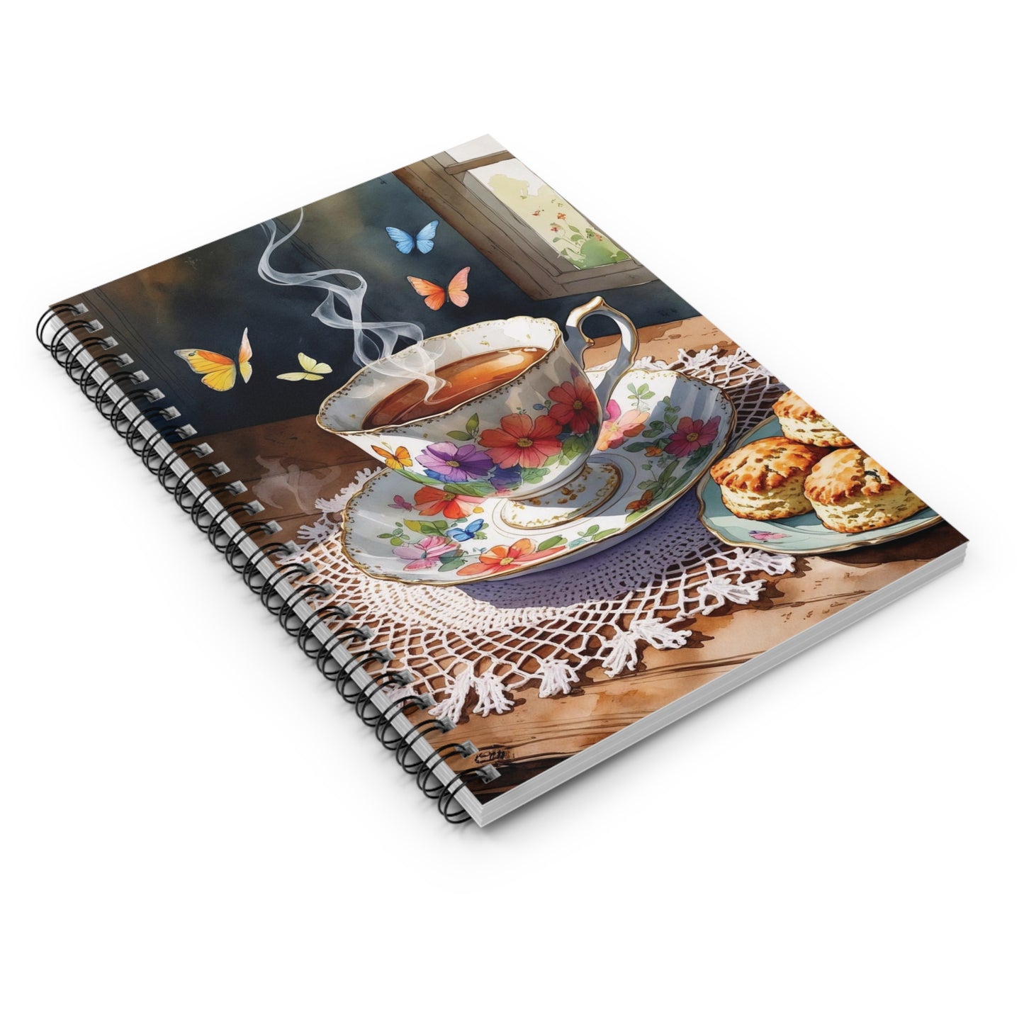 Notebook with a tea cup and scones design on the cover