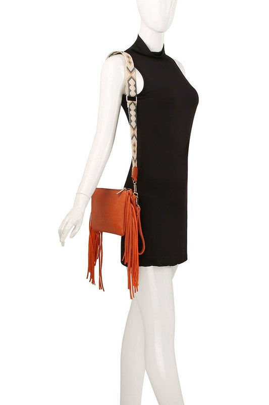 Rust Aztec Guitar Strap Fringe Clutch Crossbody on Mannequin