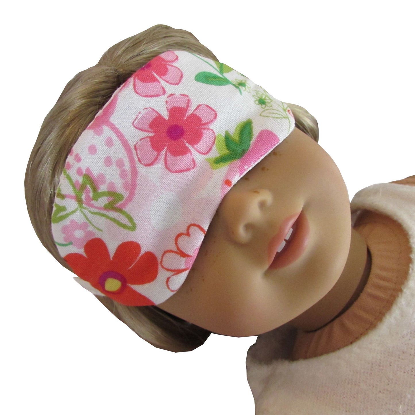 18 inch doll wearing a floral sleep mask
