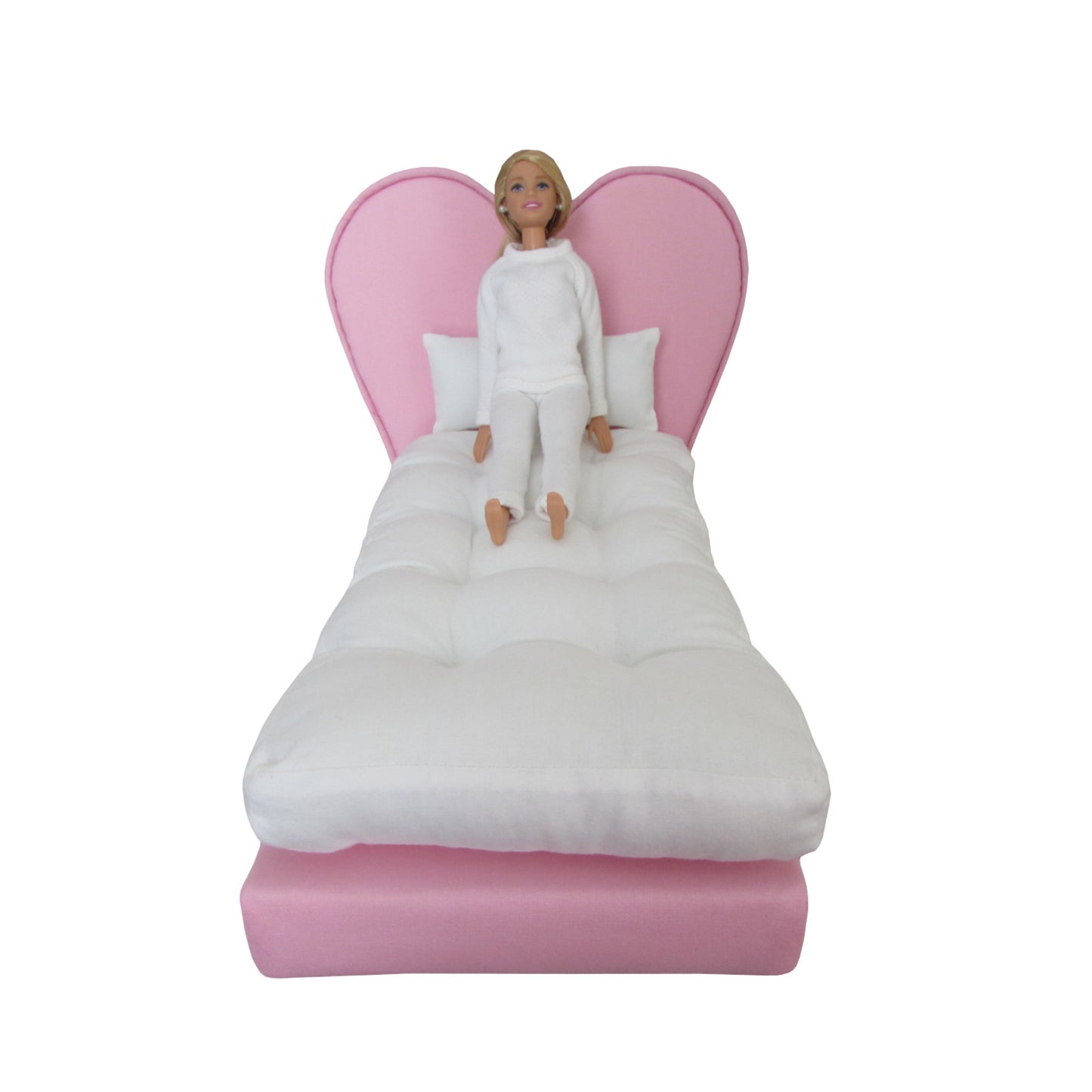 Upholstered Pink Heart Doll Bed for 11 1/2-inch and 12-inch dolls Front view with doll