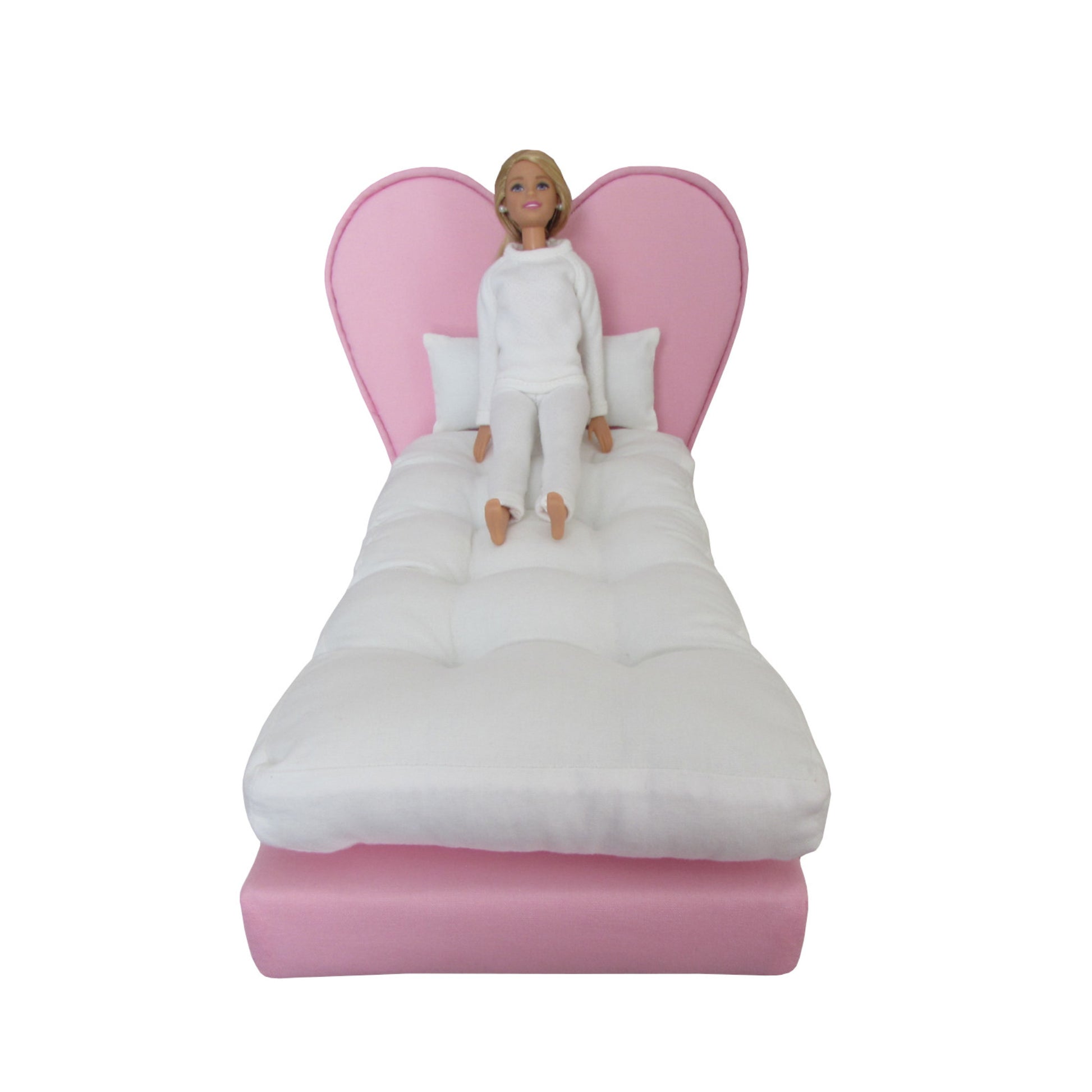 Upholstered Pink Heart Doll Bed for 11 1/2-inch and 12-inch dolls Front view with doll