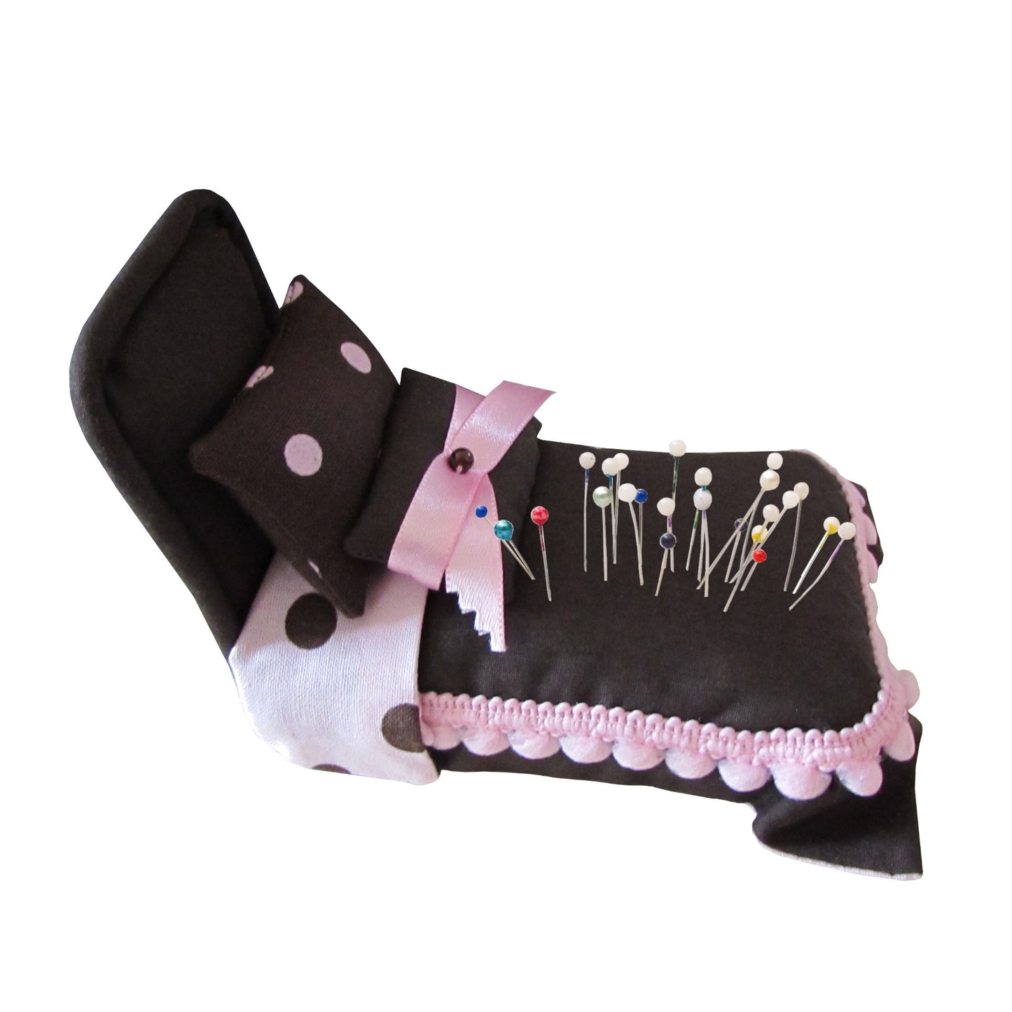 Brown Pincushion Bed with Pink-Trimmed Bedding Side view with pins