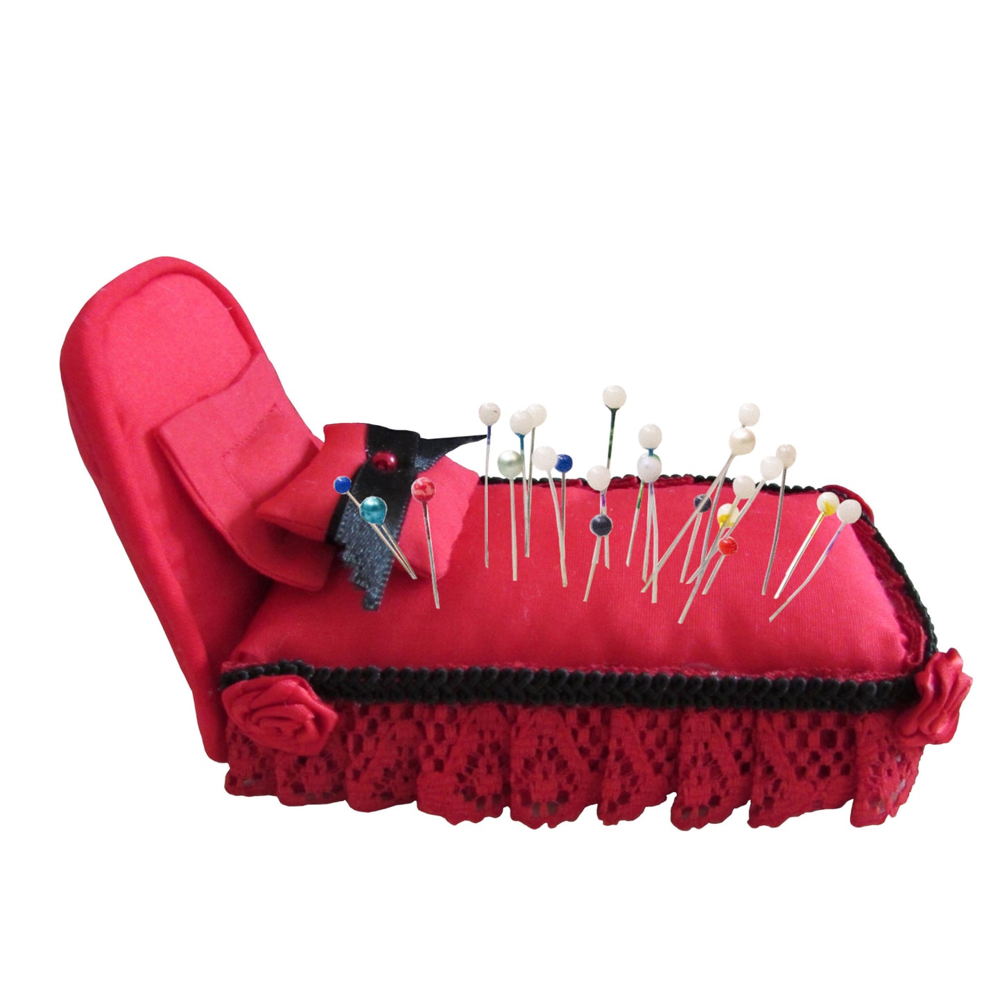 Red Pincushion Bed with Lace and Rose Trim Side view with pins