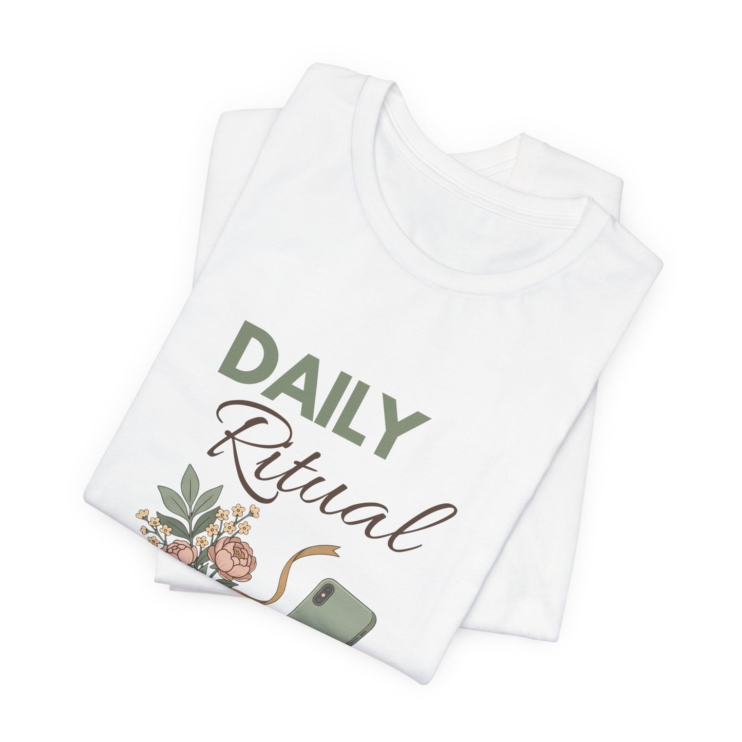 White t-shirt with 'Daily Ritual' text and floral design on a white background
