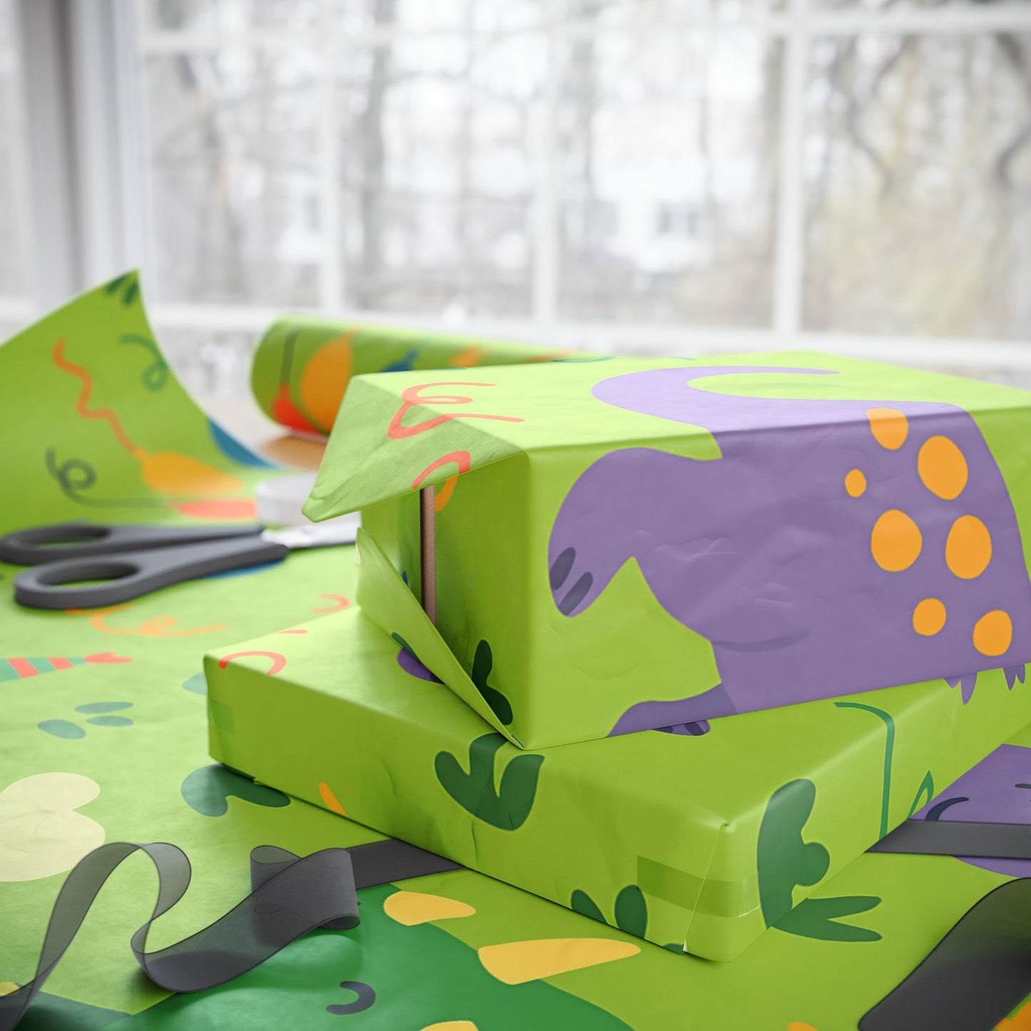 Dinosaur Party Wrapping Paper – Colorful Dinos with Balloons & Hats on Green