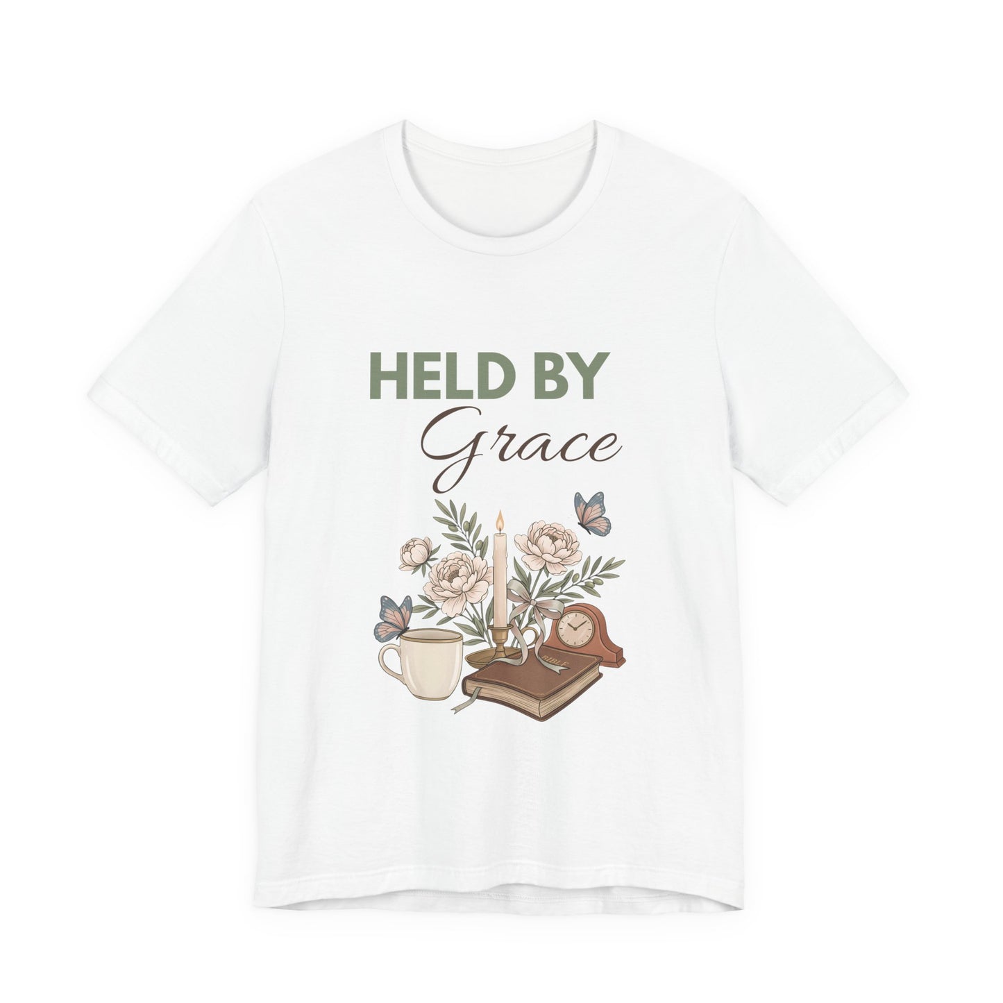 White t-shirt with floral design and 'HELD BY Grace' text on a white background