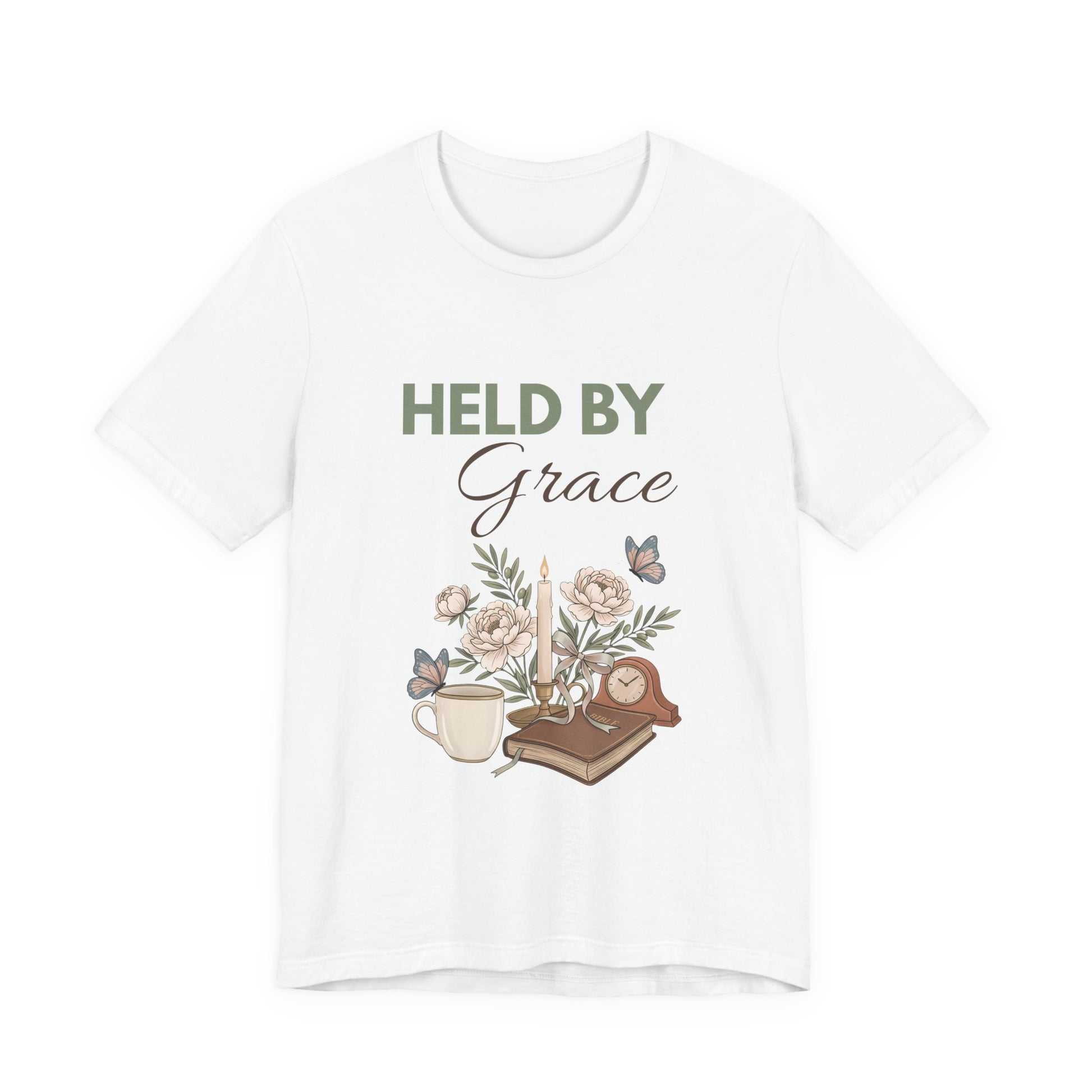 White t-shirt with floral design and 'HELD BY Grace' text on a white background