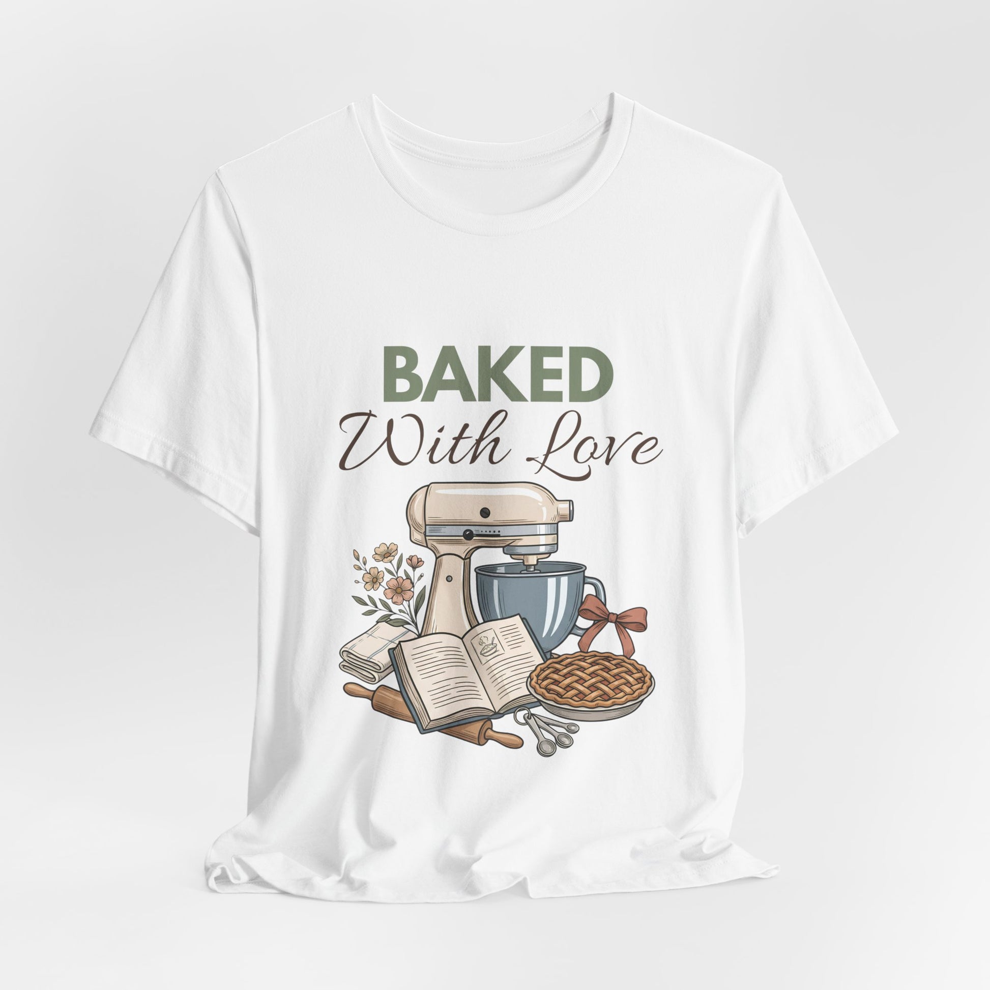 A hanging white t-shirt with 'BAKED With Love' on the front.