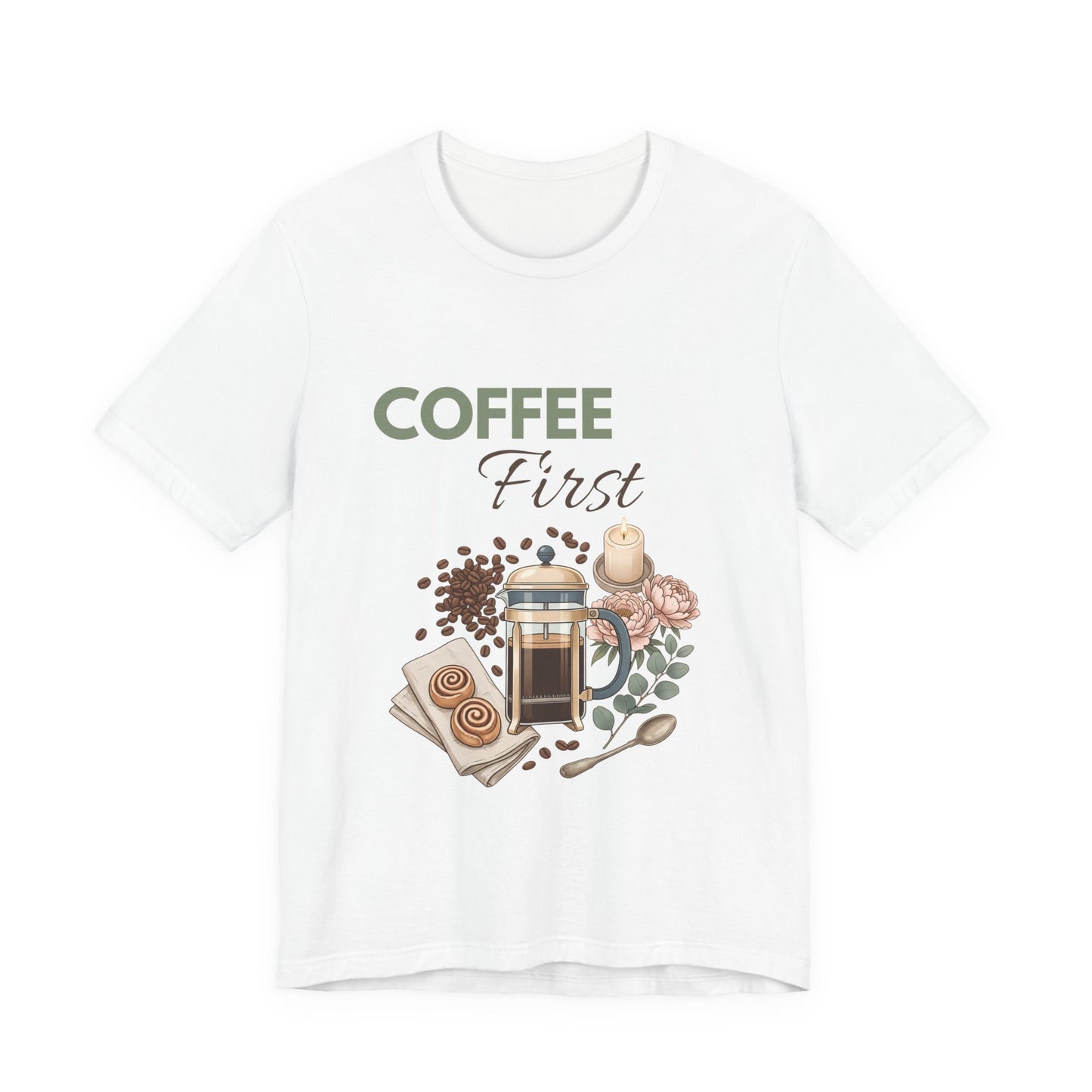 White t-shirt with 'Coffee First' graphic design featuring a coffee press, coffee beans, and flowers on a white background.