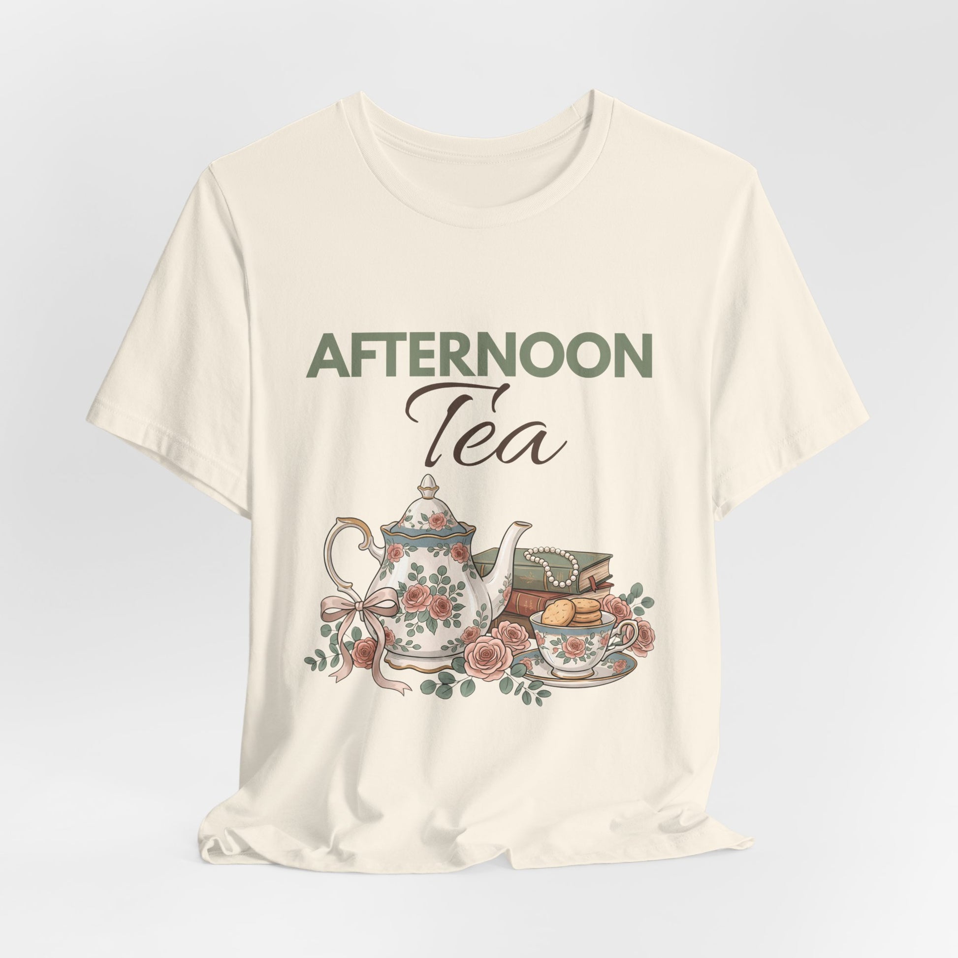A hanging natural colored t-shirt with 'AFTERNOON Tea' on the front.