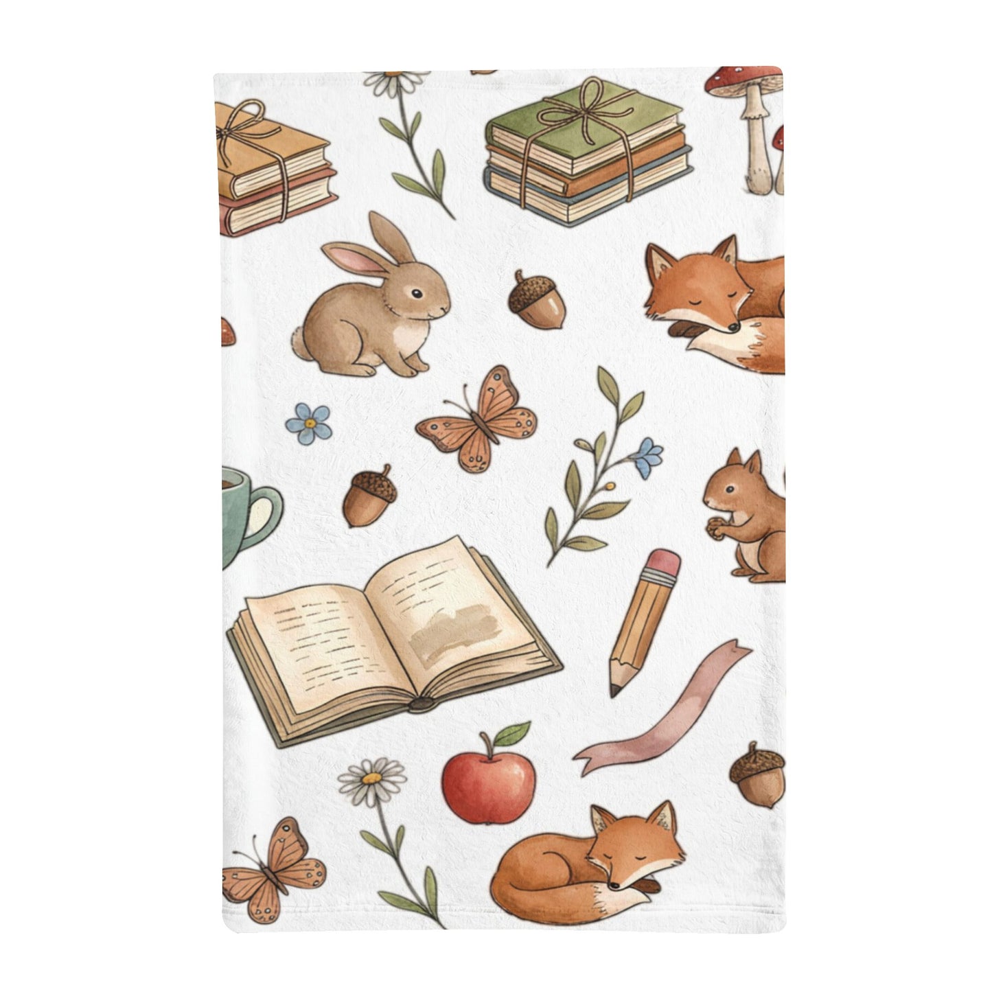 A white minky sleeping bag featuring a whimsical woodland pattern with illustrated rabbits, foxes, butterflies, acorns, flowers, an open book, a pencil, a mushroom, and an apple.