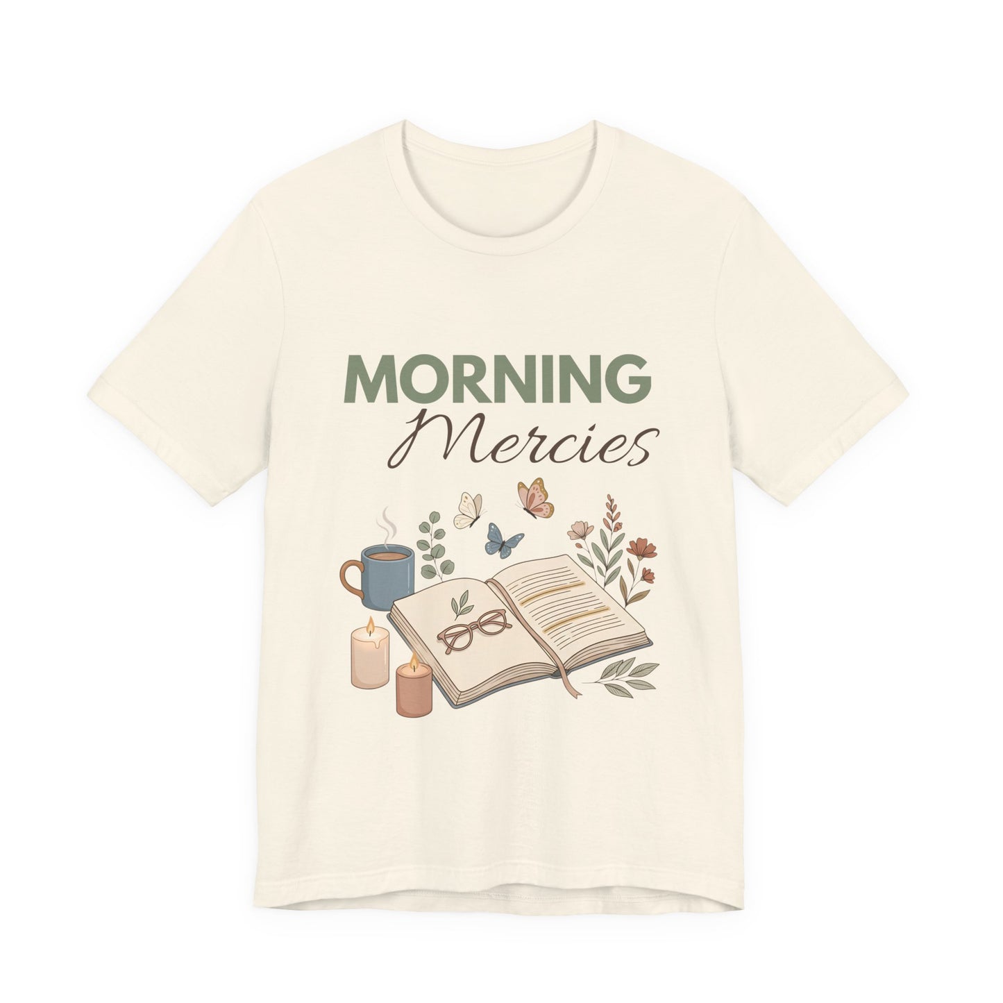 A natural colored t-shirt with 'Morning Mercies' text and illustrations on a white background