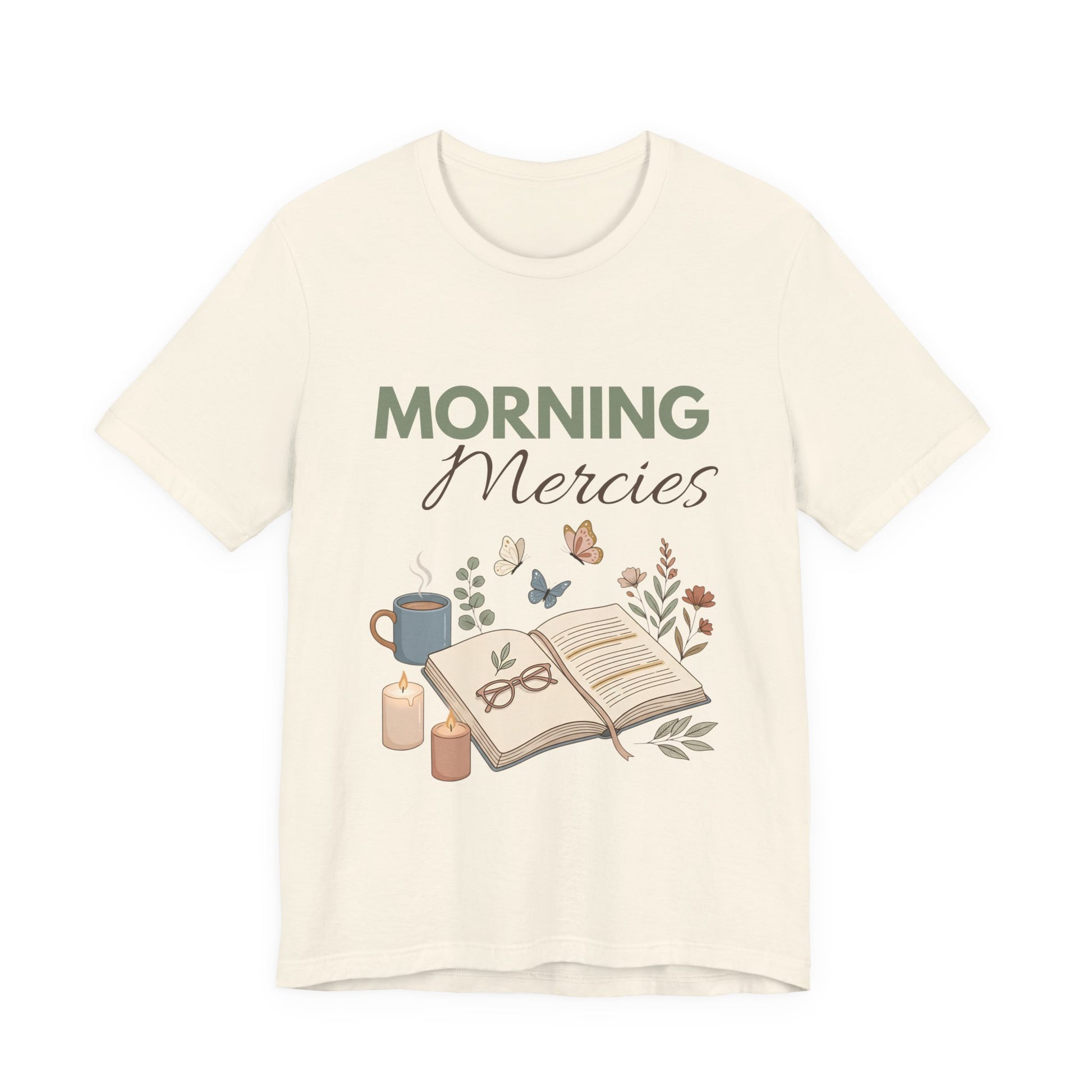 A natural colored t-shirt with 'Morning Mercies' text and illustrations on a white background