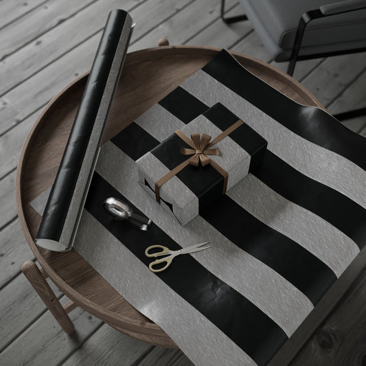 Gift box with a bow and scissors on a striped surface with a wooden tray.