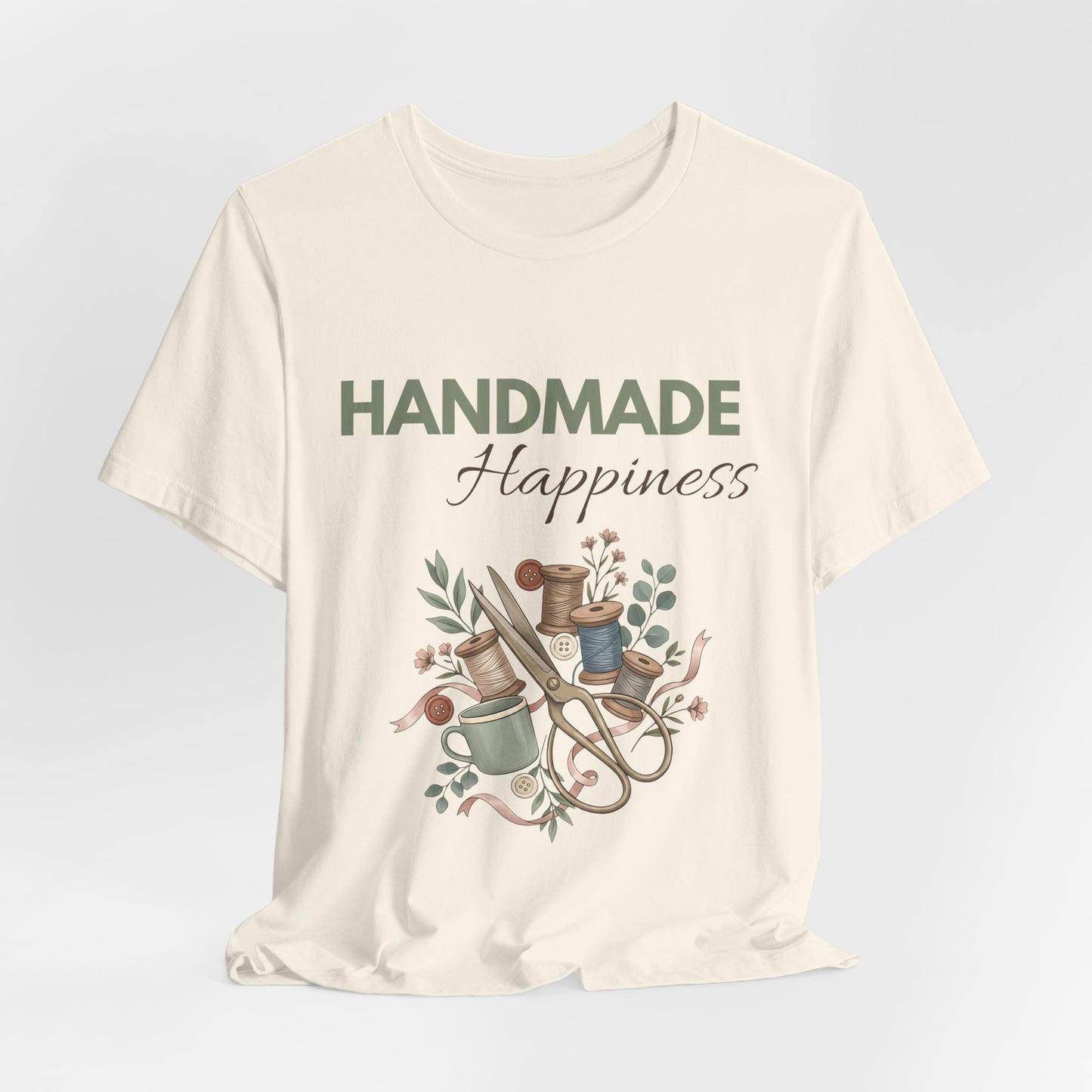 A hanging t-shirt with "HANDMADE Happiness' on the front.