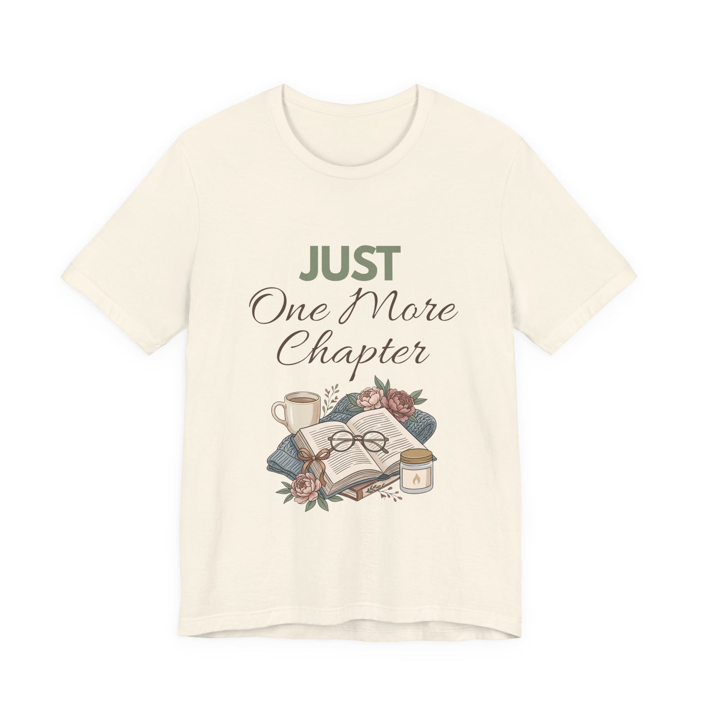Natural colored t-shirt with 'Just One More Chapter' text and book-themed graphic on a white background