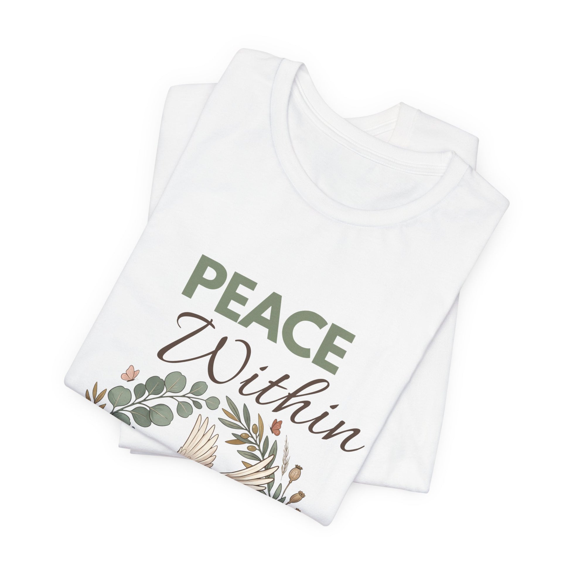 Folded white t-shirts with 'Peace Within' text and floral design on a white background
