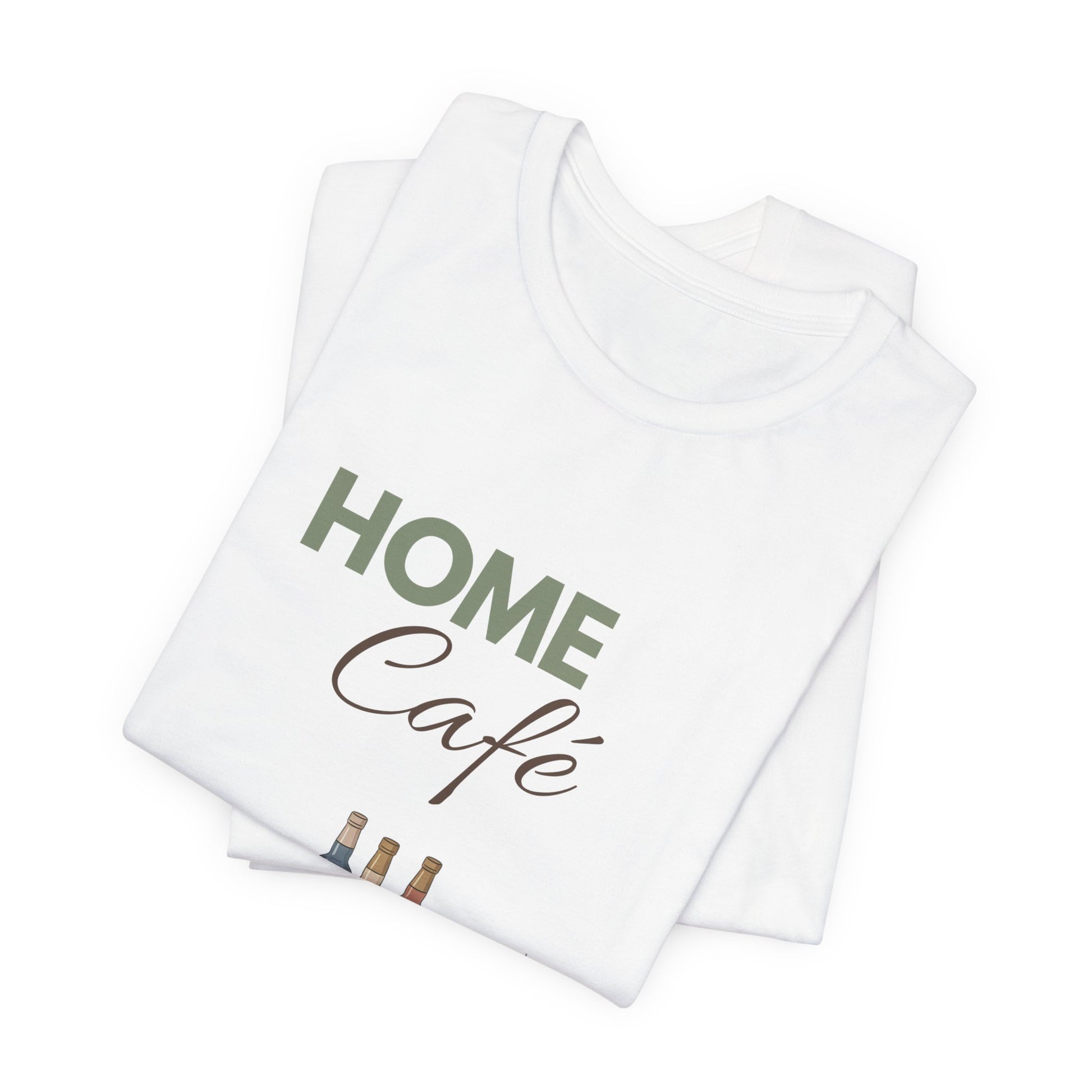 Folded white t-shirt with 'HOME Café' text and bottle graphics on a white background