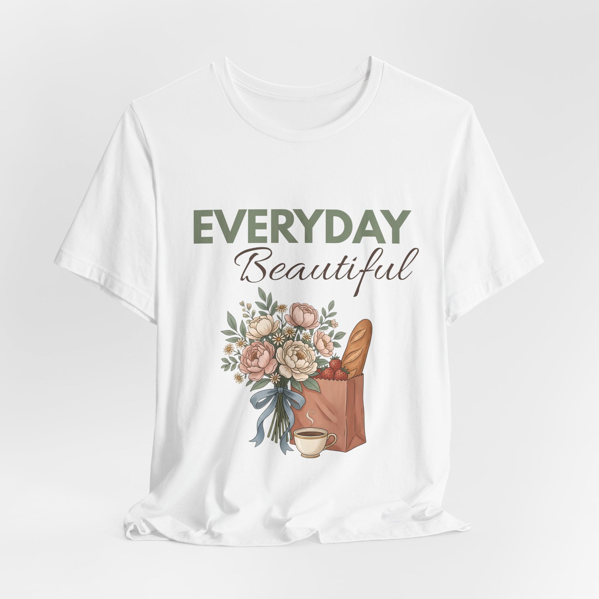 A hanging white t-shirt with 'EVERYDAY Beautiful' on the front.