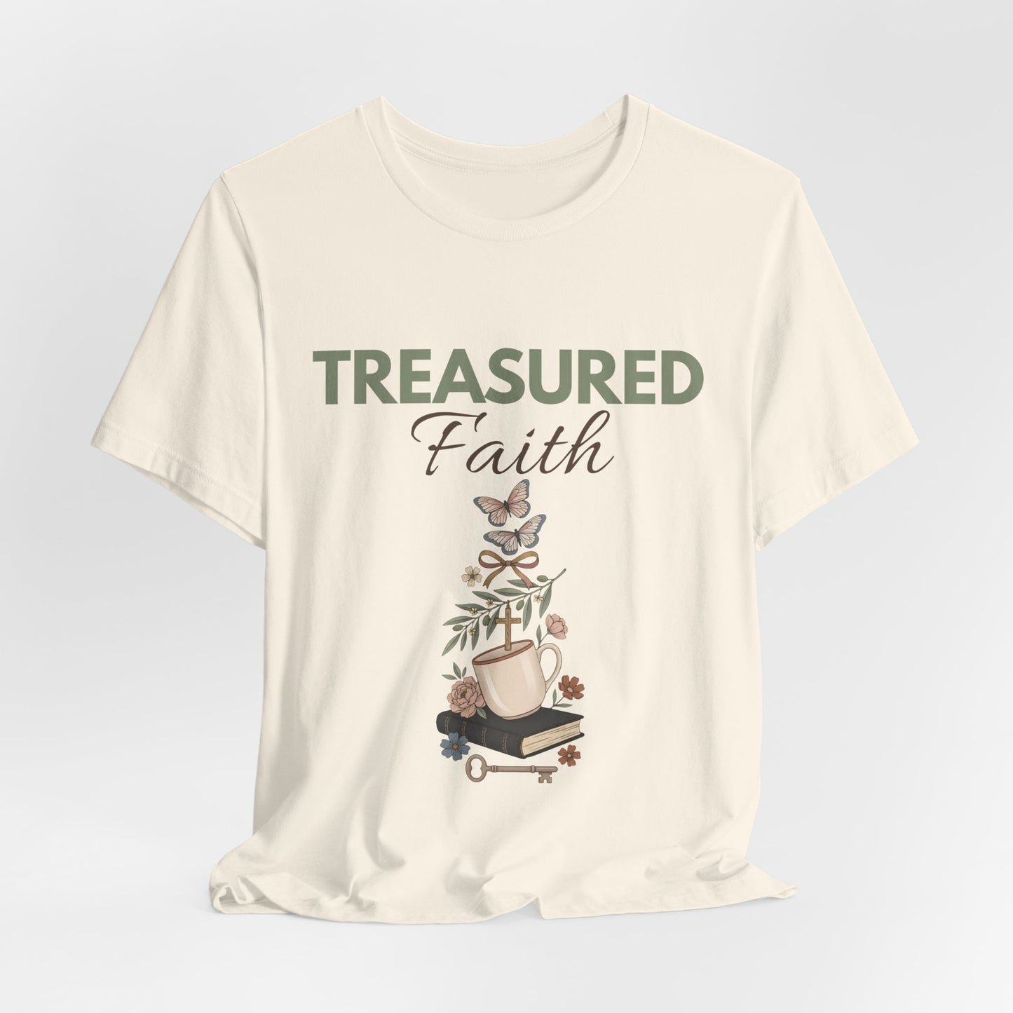 Natural colored t-shirt with 'Treasured Faith' graphic design on a light gray background