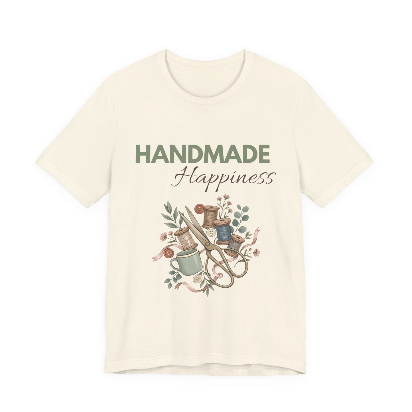 A natural colored t-shirt with 'HANDMADE Happiness' on the front.