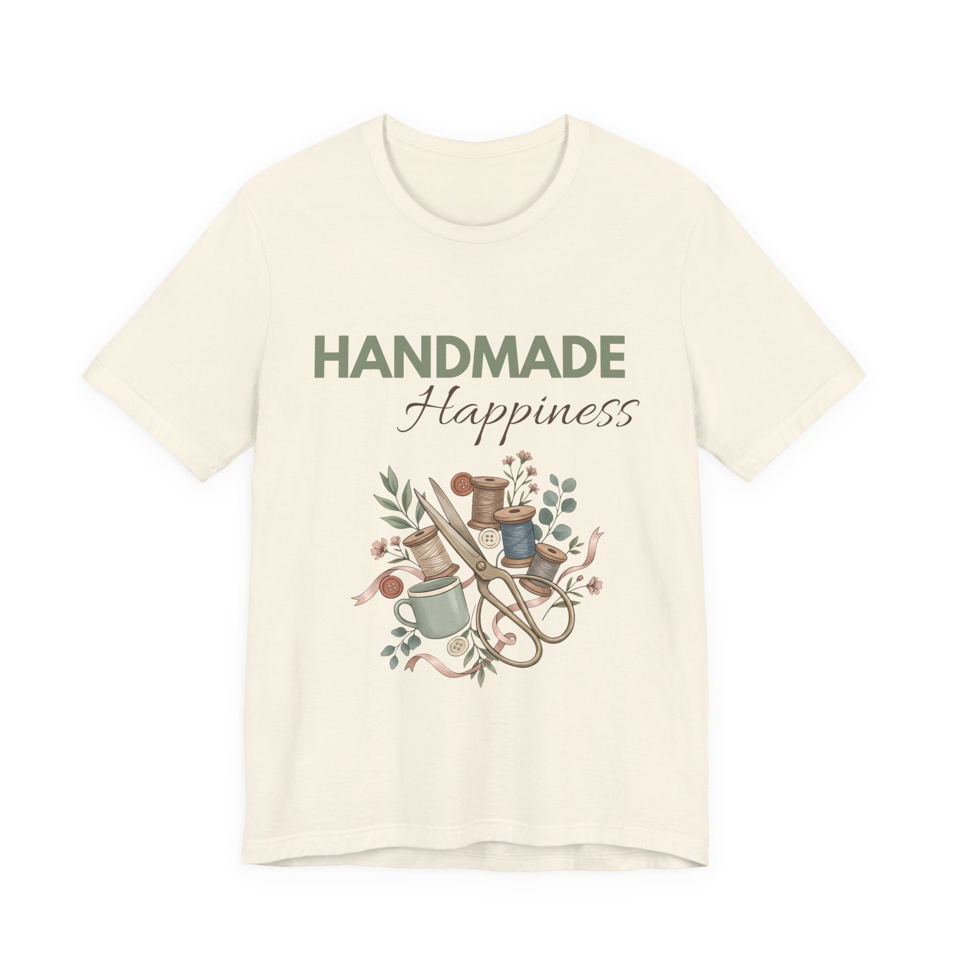 A natural colored t-shirt with 'HANDMADE Happiness' on the front.