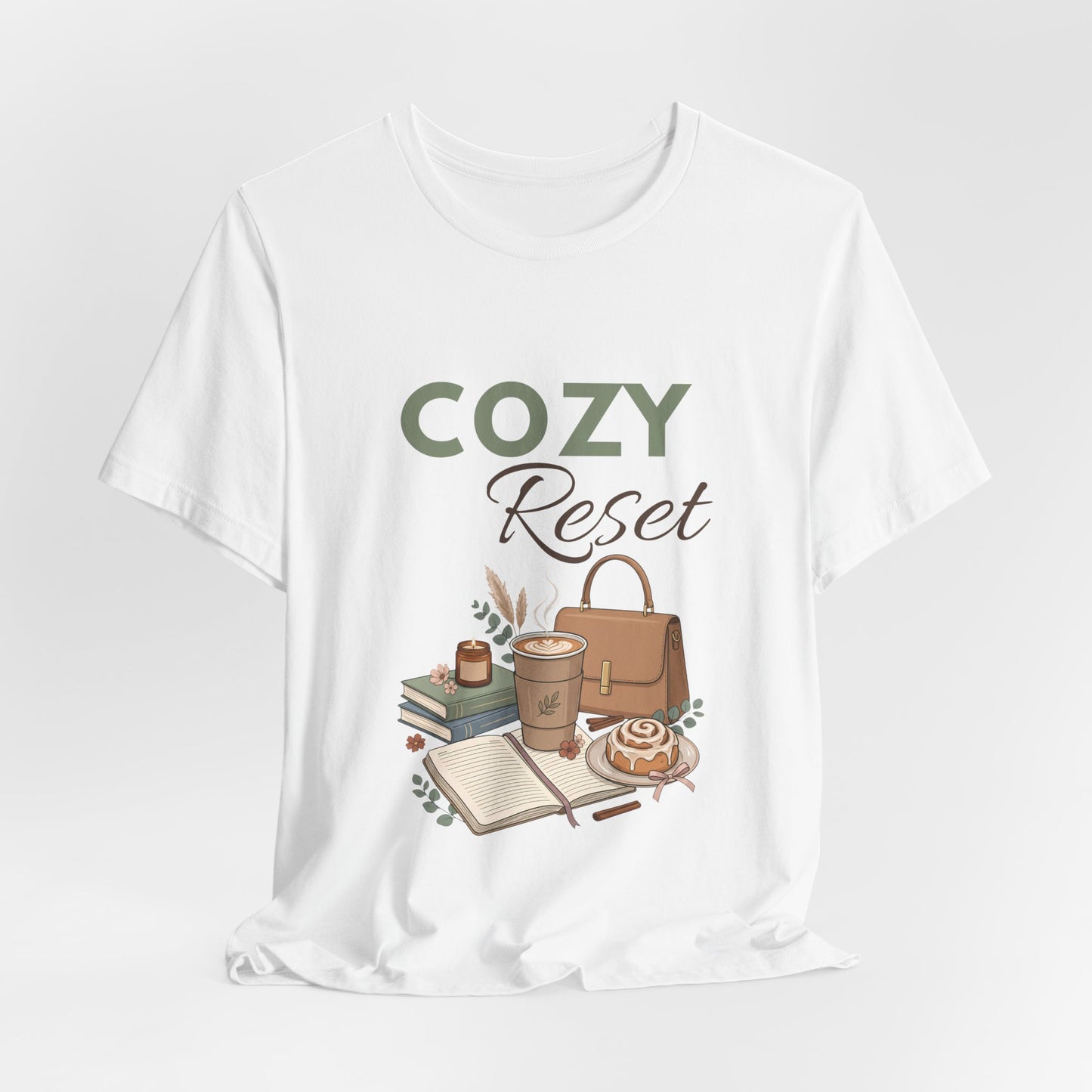 A hanging white t-shirt with 'COZY Reset' on the front.