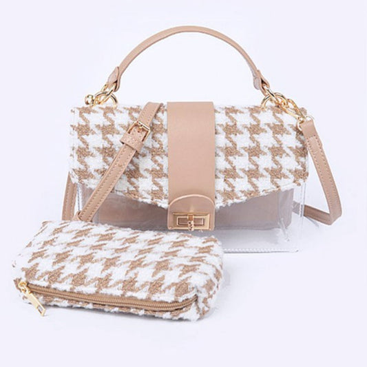 Handbag with houndstooth pattern and matching pouch on a white background