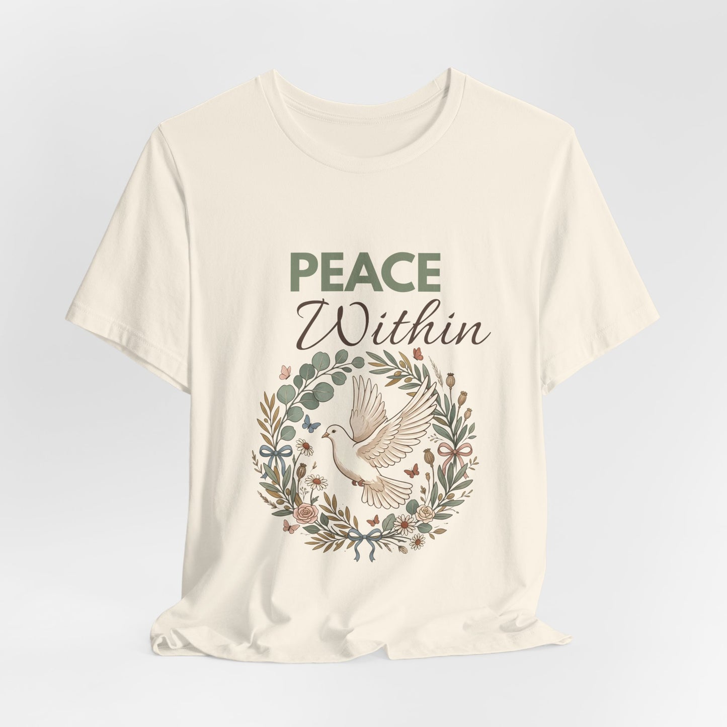 Natural colored t-shirt with 'Peace Within' text and dove design on a light gray background