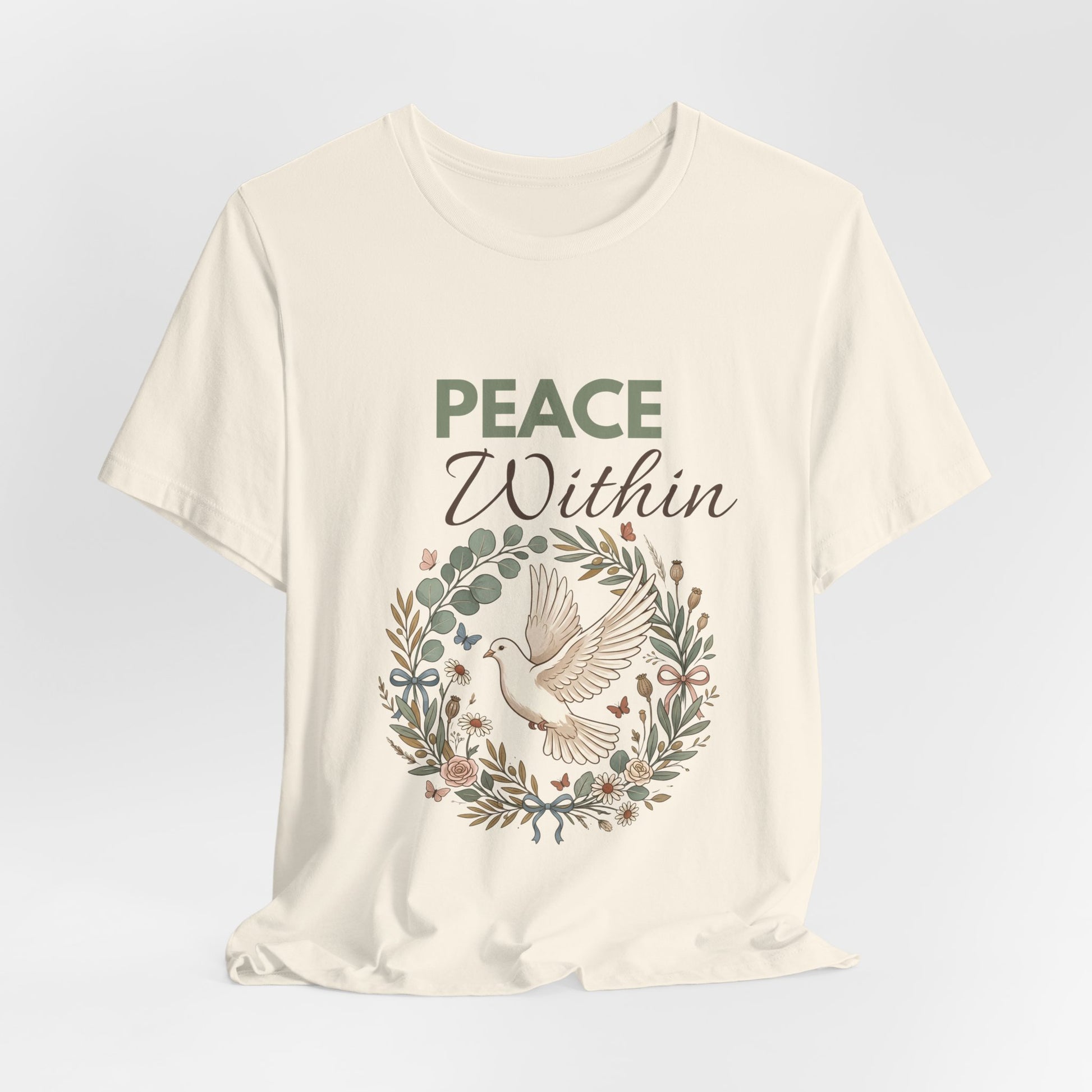 Natural colored t-shirt with 'Peace Within' text and dove design on a light gray background