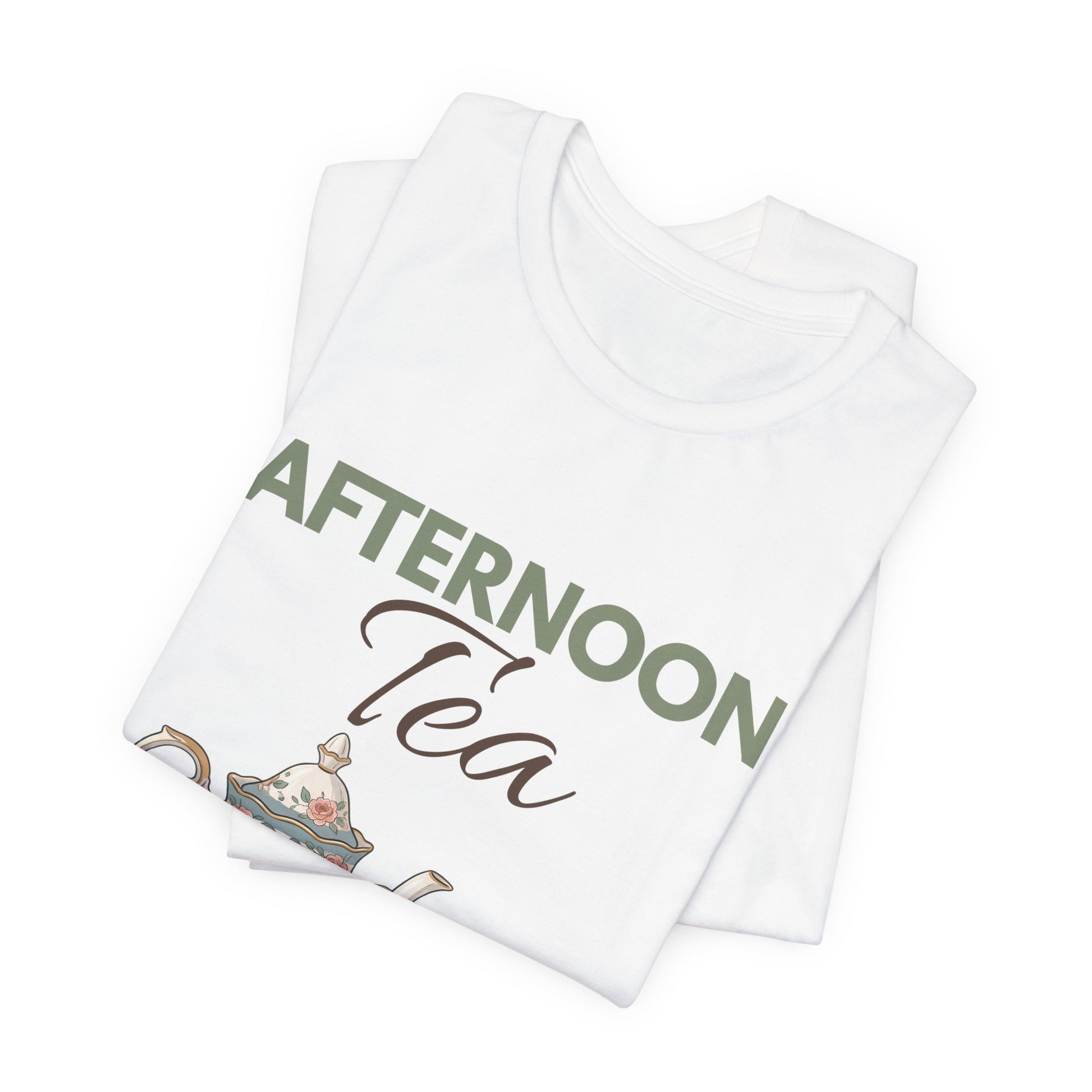 A folded white t-shirt with 'AFTERNOON Tea' on the front.