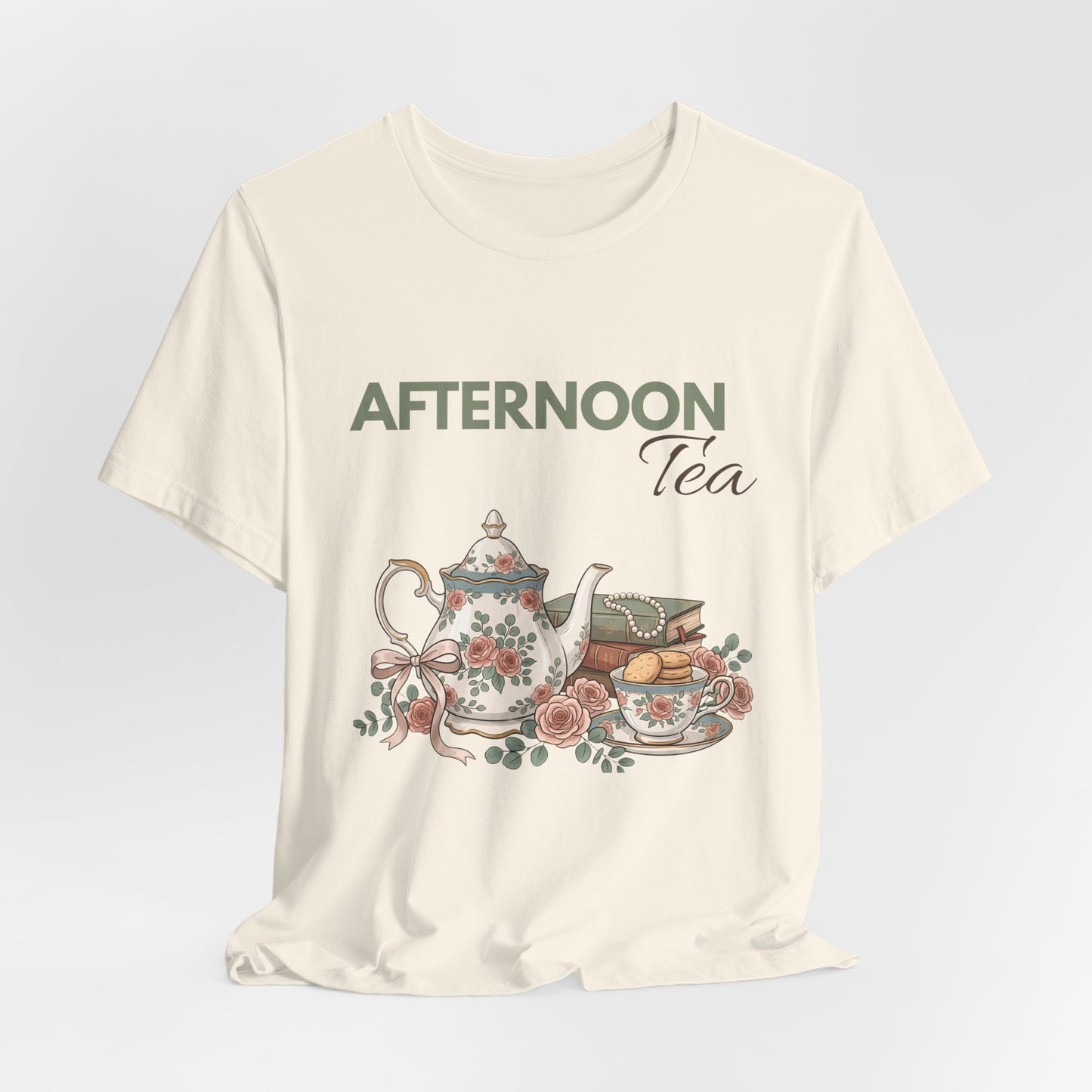 A hanging natural colored t-shirt with 'AFTERNOON Tea' on the front.