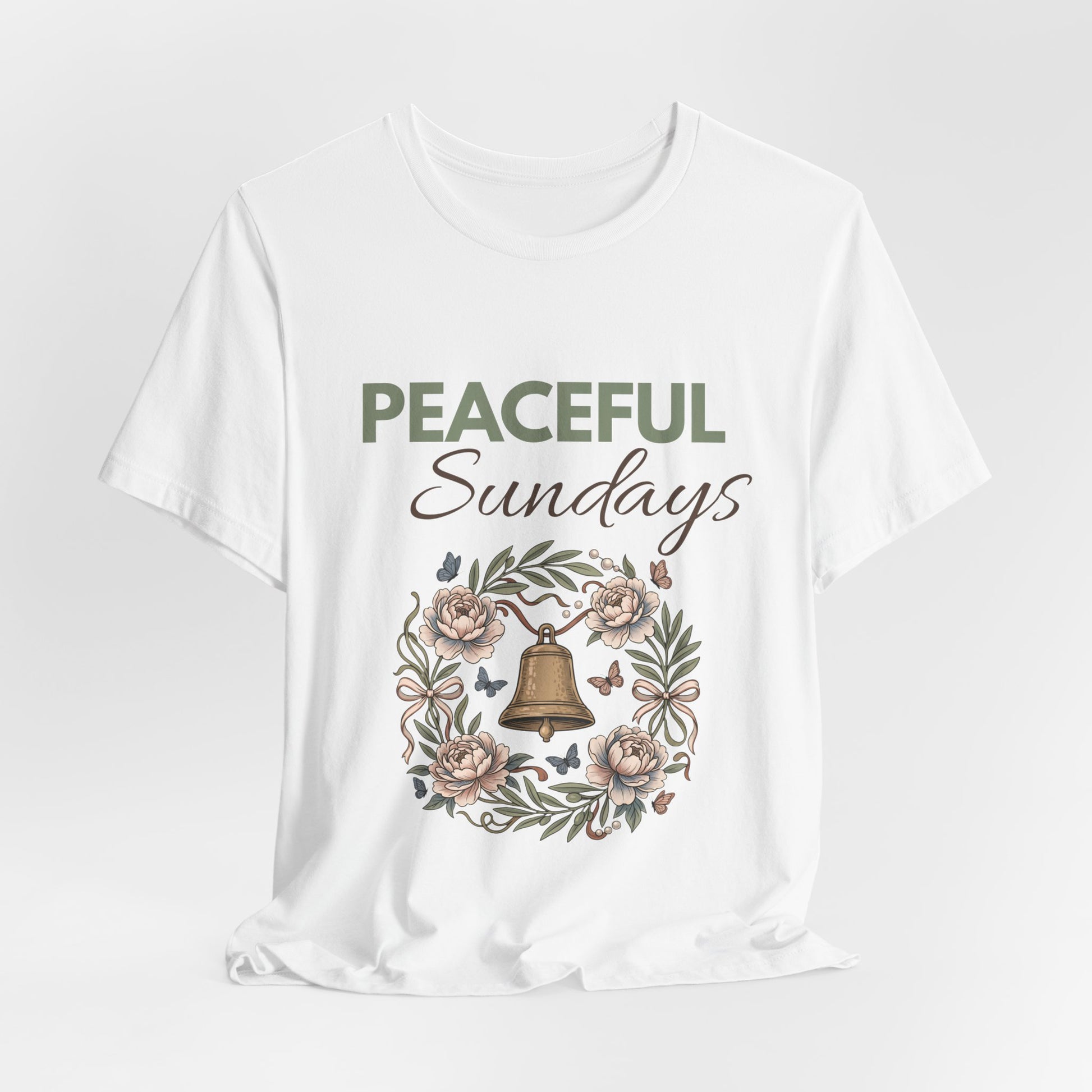 White t-shirt with 'Peaceful Sundays' text and floral design on a white background
