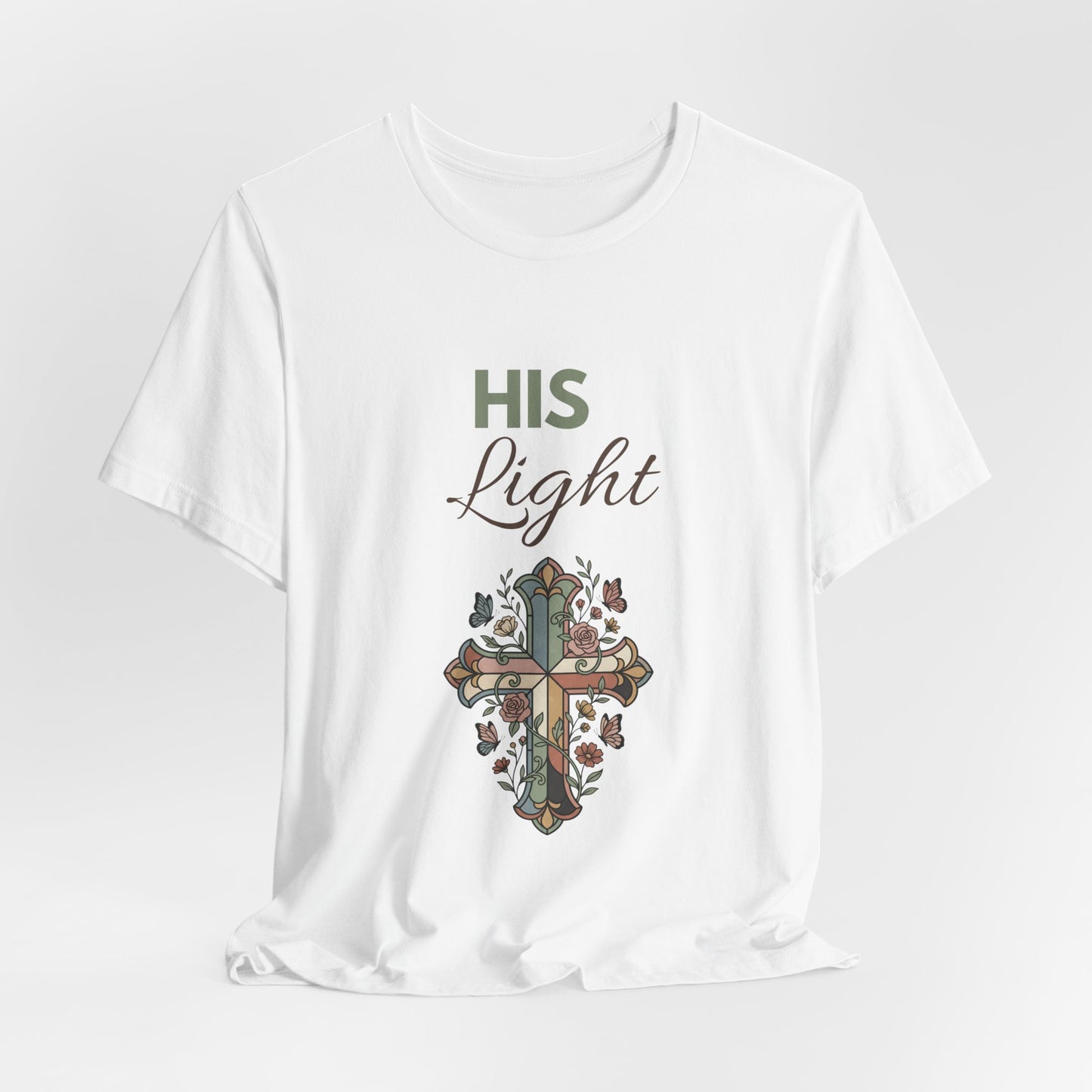 White t-shirt with a cross design and 'HIS Light' text on a white background