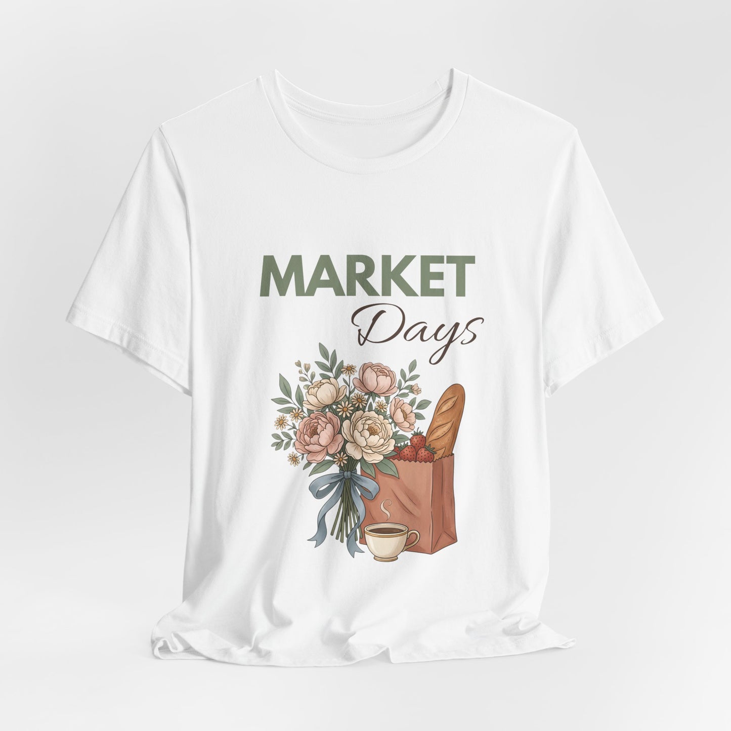 A hanging white t-shirt with 'Market Days' on the front.