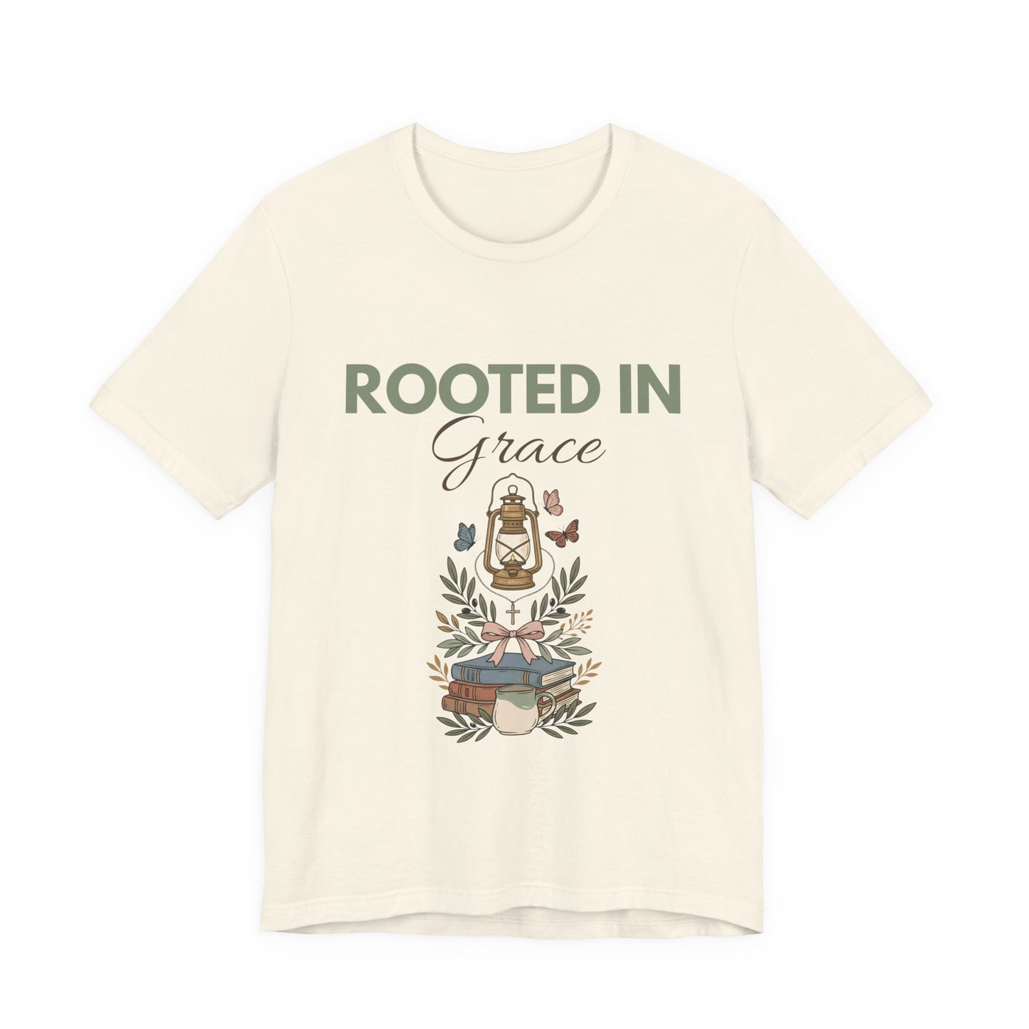 A natural colored t-shirt with 'Rooted in Grace' text and graphic design on a white background