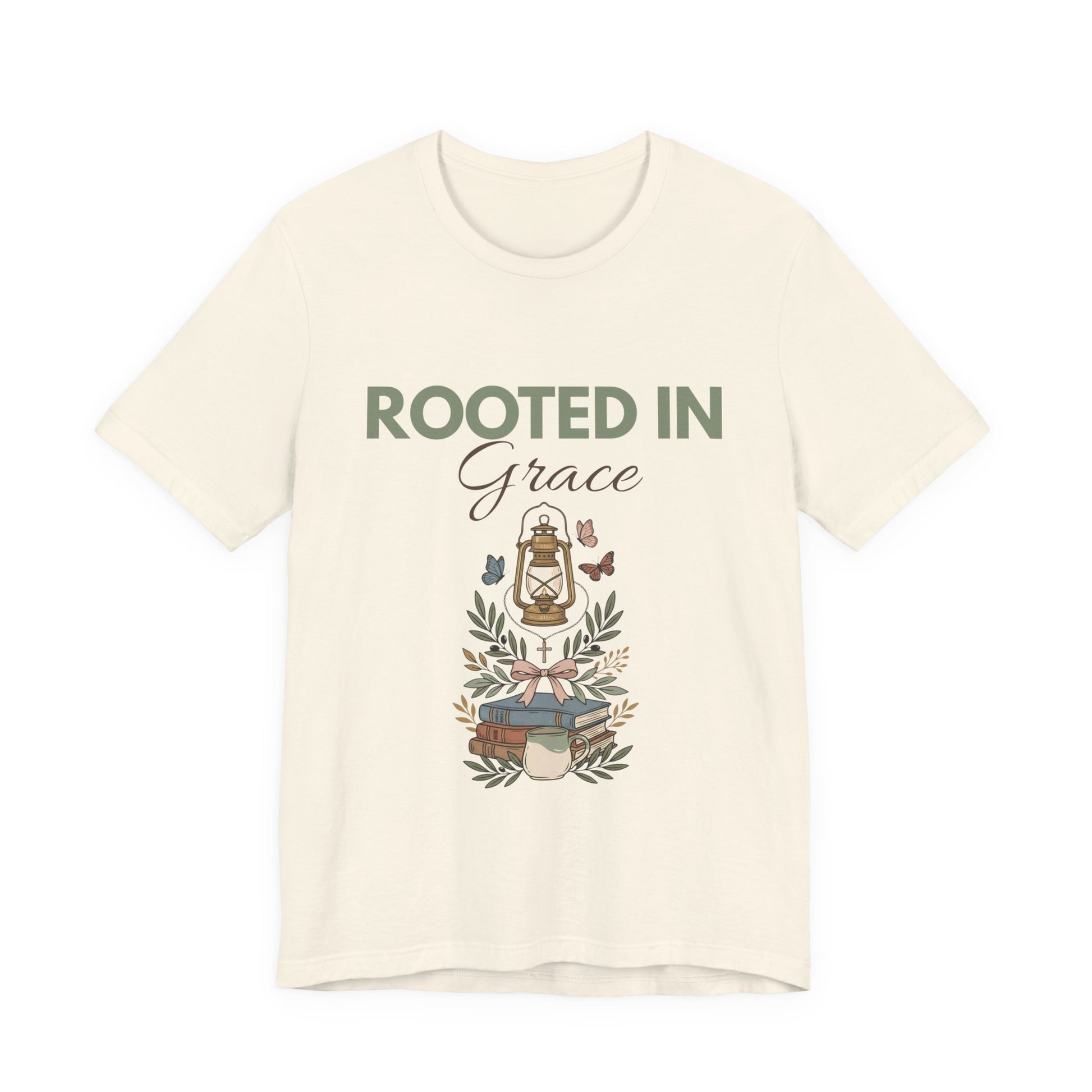 A natural colored t-shirt with 'Rooted in Grace' text and graphic design on a white background