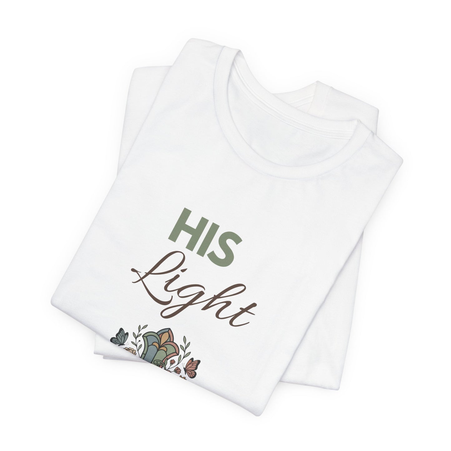 White shirt with 'His Light' text and floral design on a white background