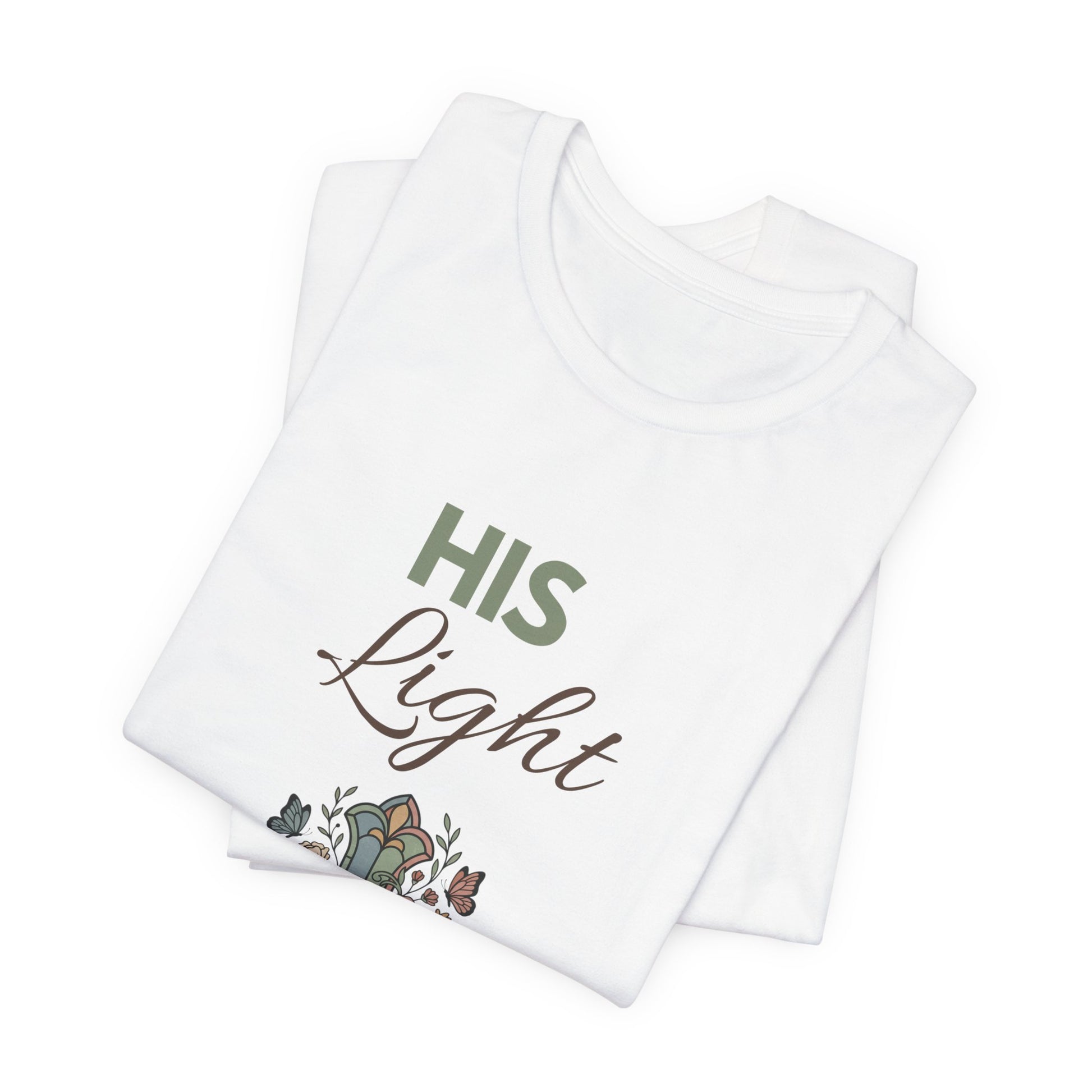 White shirt with 'His Light' text and floral design on a white background