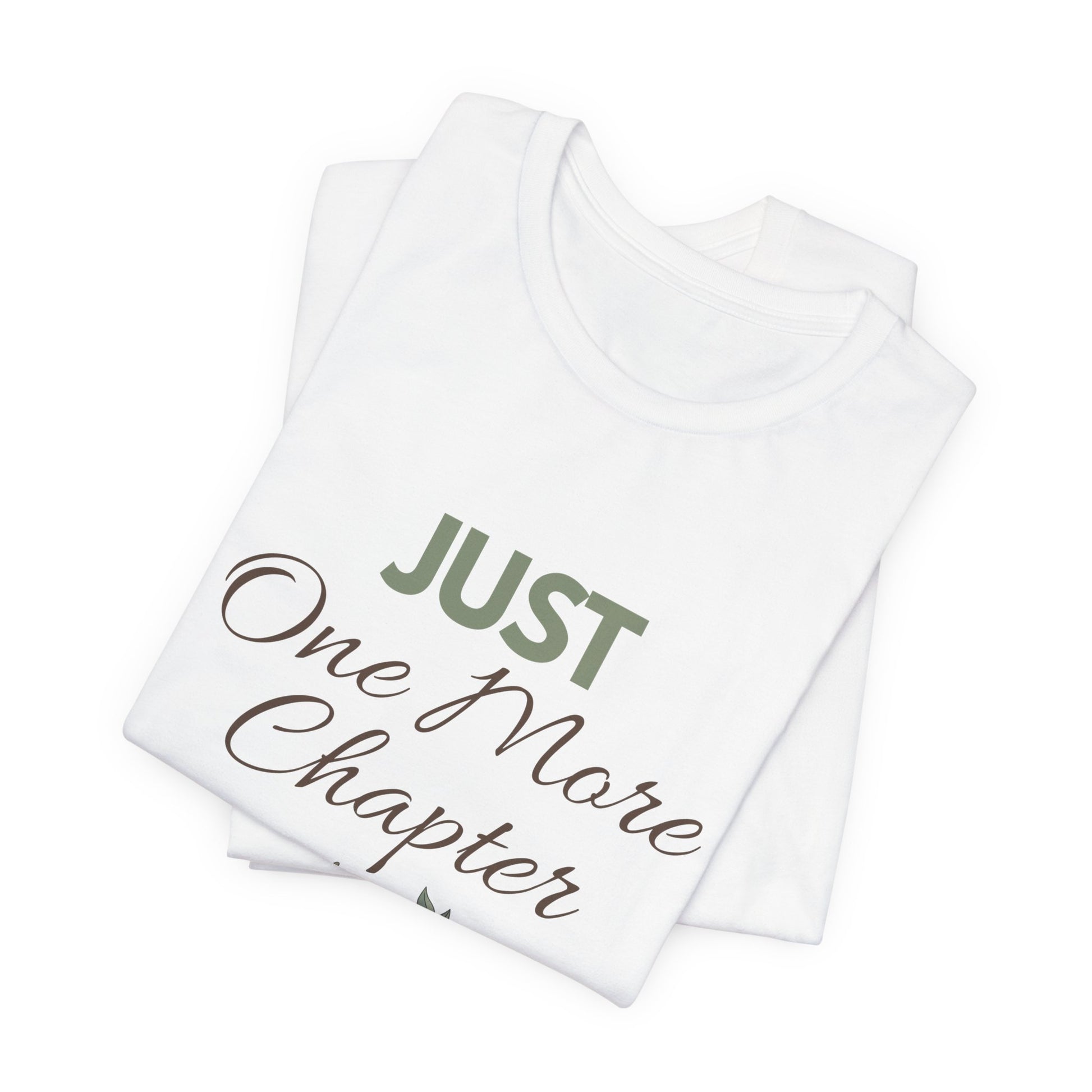 White t-shirt with 'Just One More Chapter' text on a white background