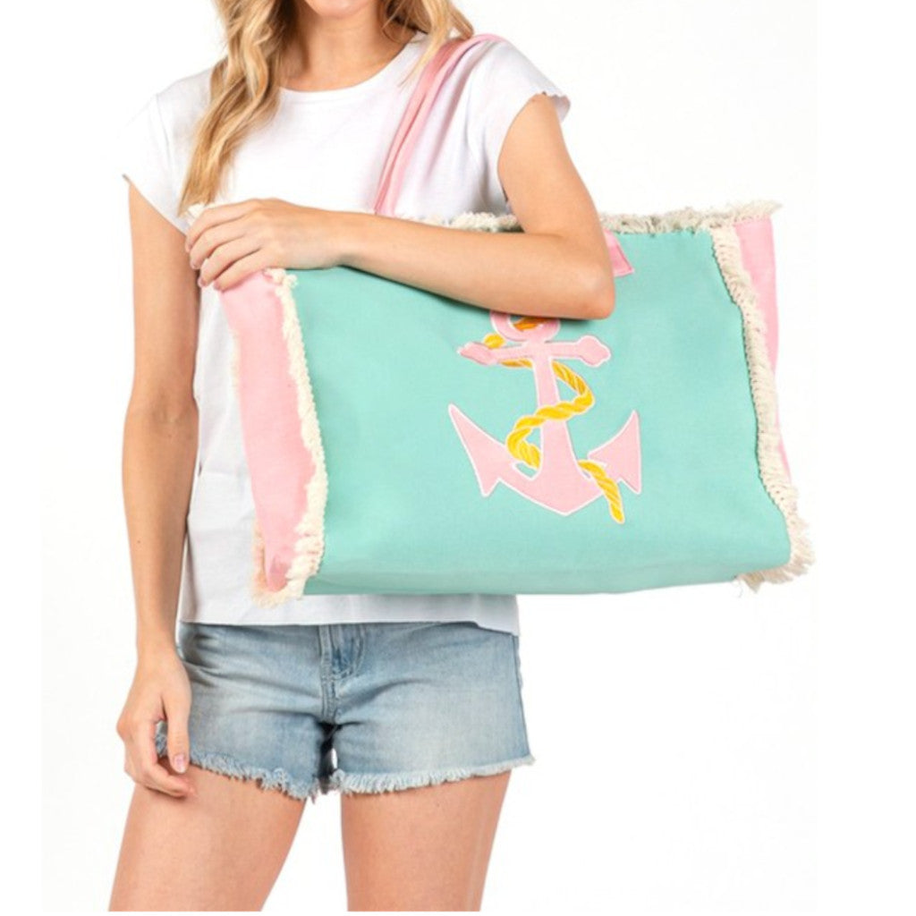 A woman holding an Anchor Fringe Oversized Fashion Tote Up Close