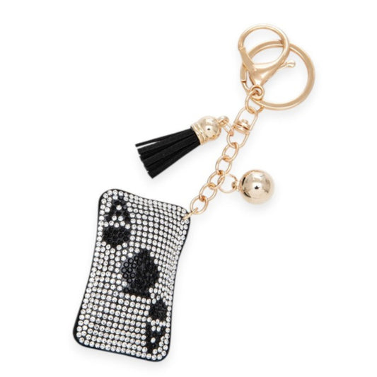 Keychain with black tassel and rhinestone design on a white background