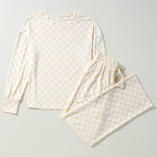 Polka dot pajama set on a light gray background